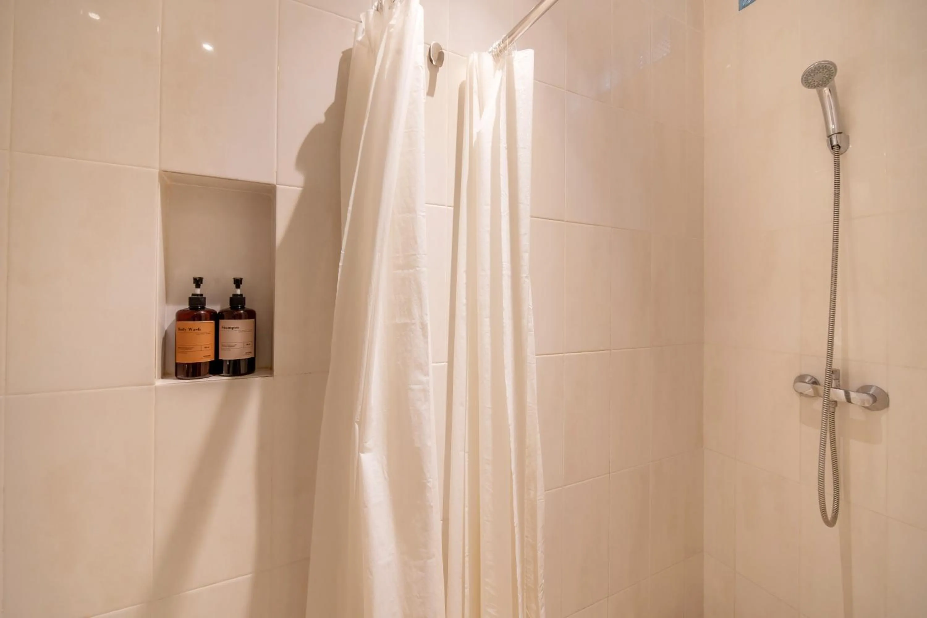 Shower in Gelatik Bed And Breakfast