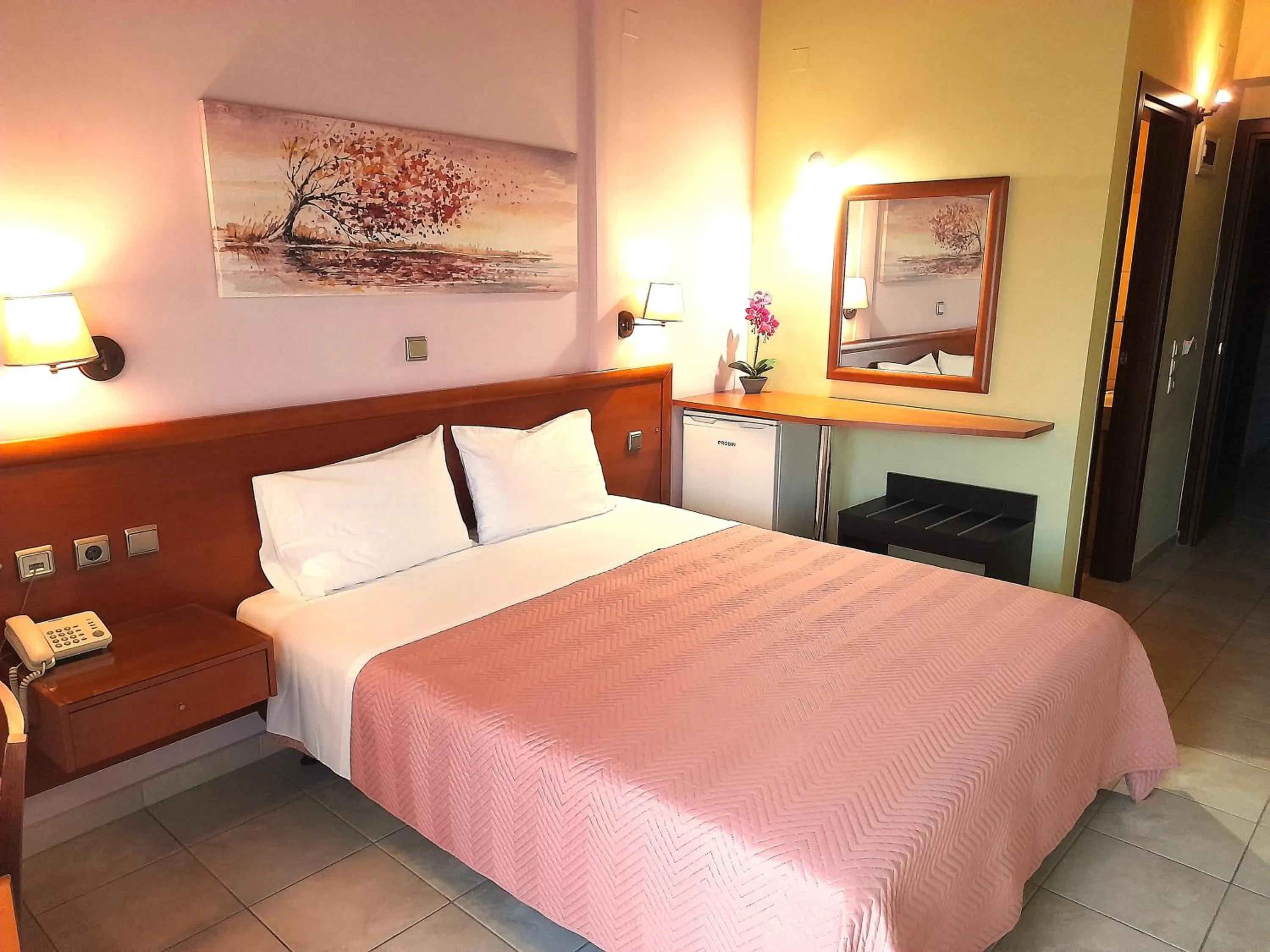 Bed in Hotel Prigipikon Suites and sofites