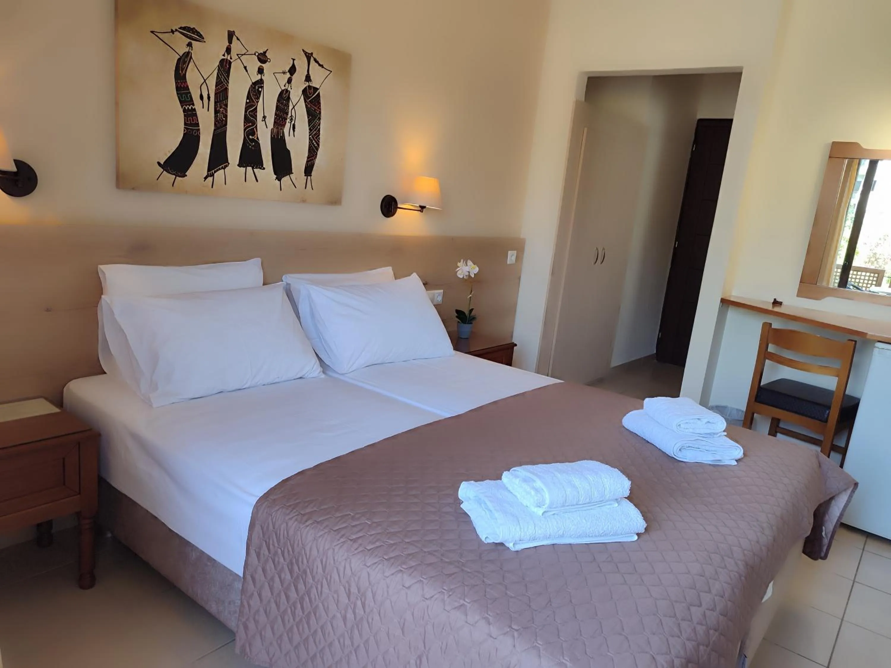 Bed in Hotel Prigipikon Suites and sofites