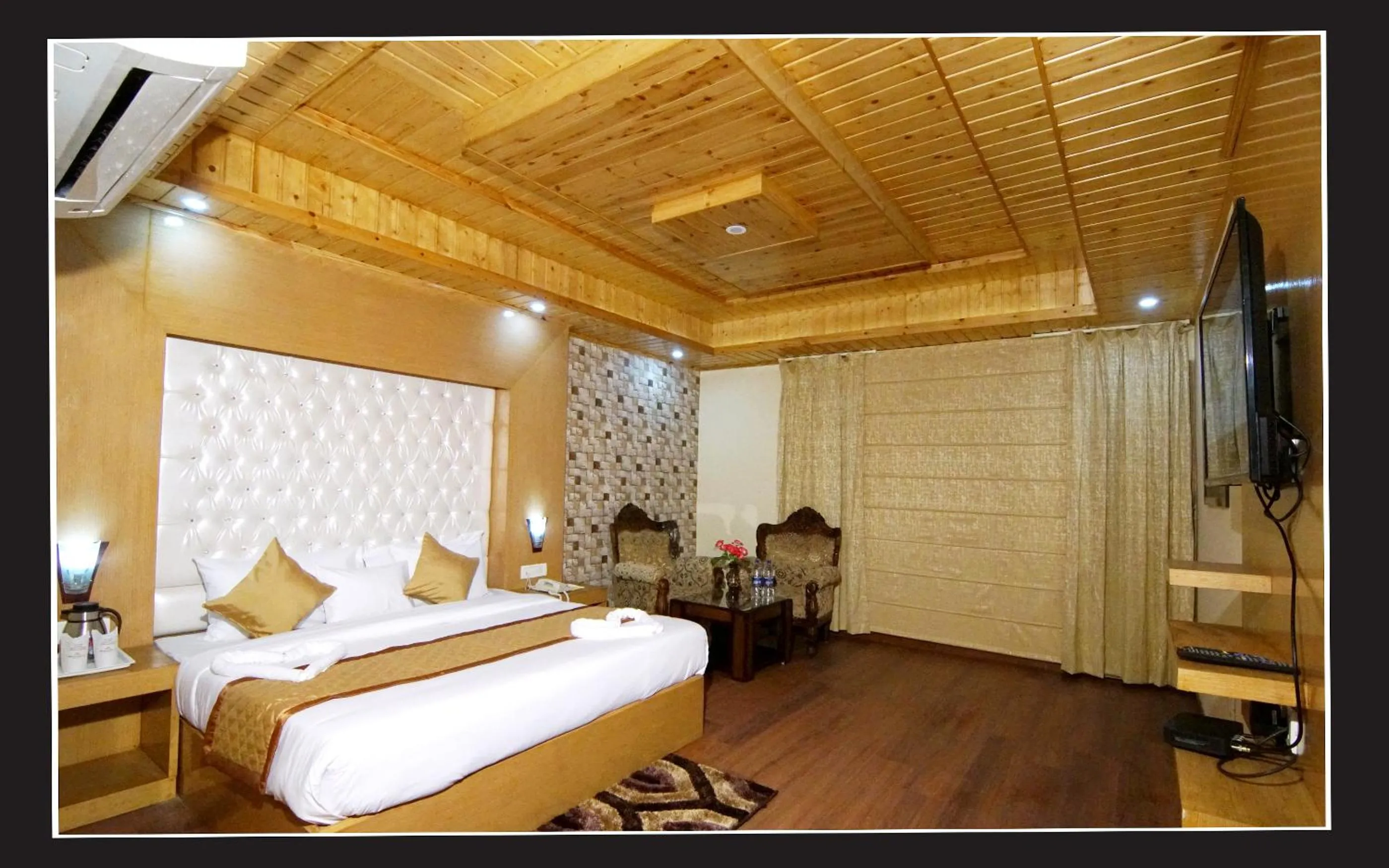 Bed in Grand Krisa Resort & SPA, Manali Experience Luxury With all Weather ACs in Every Room