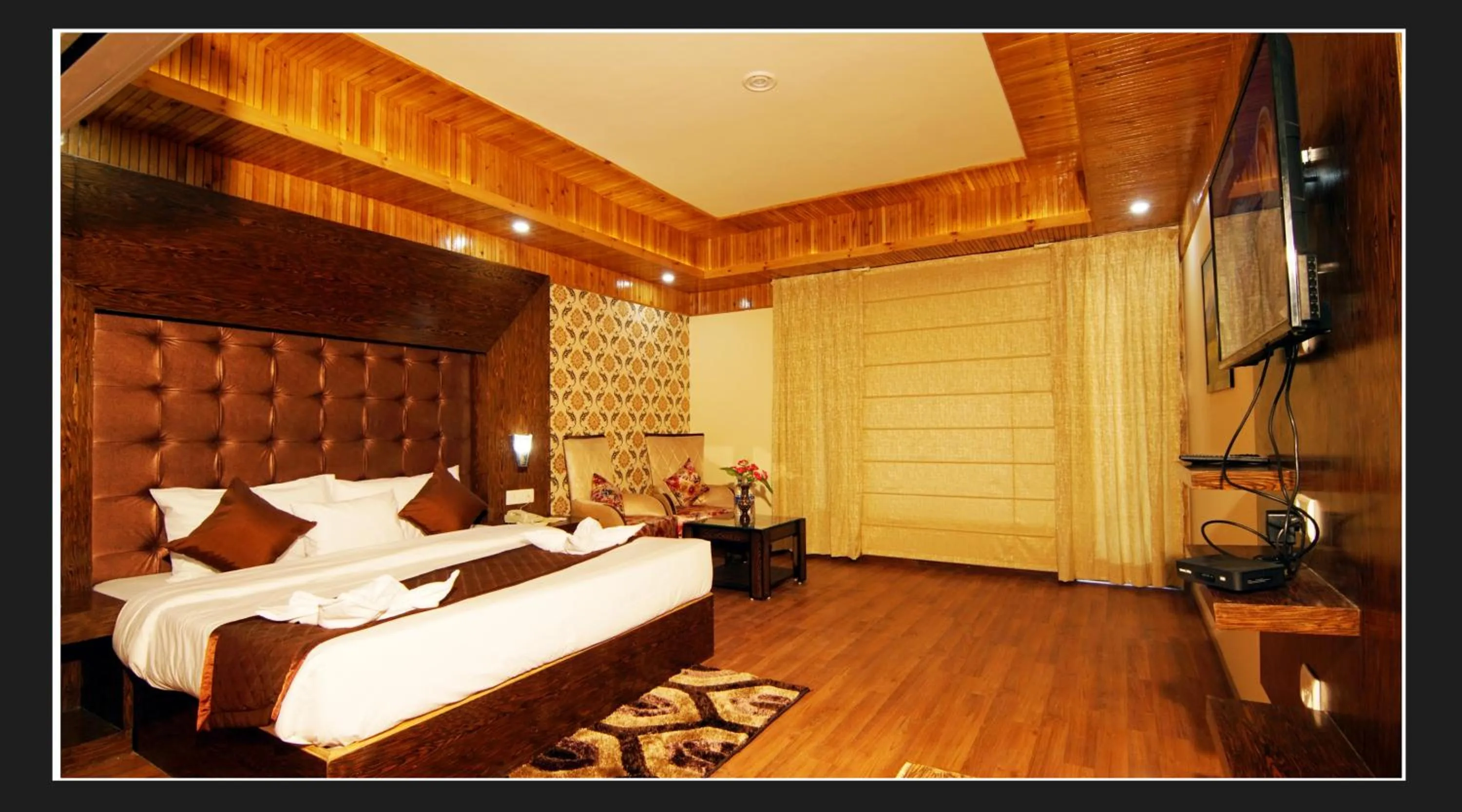 Bed in Grand Krisa Resort & SPA, Manali Experience Luxury With all Weather ACs in Every Room
