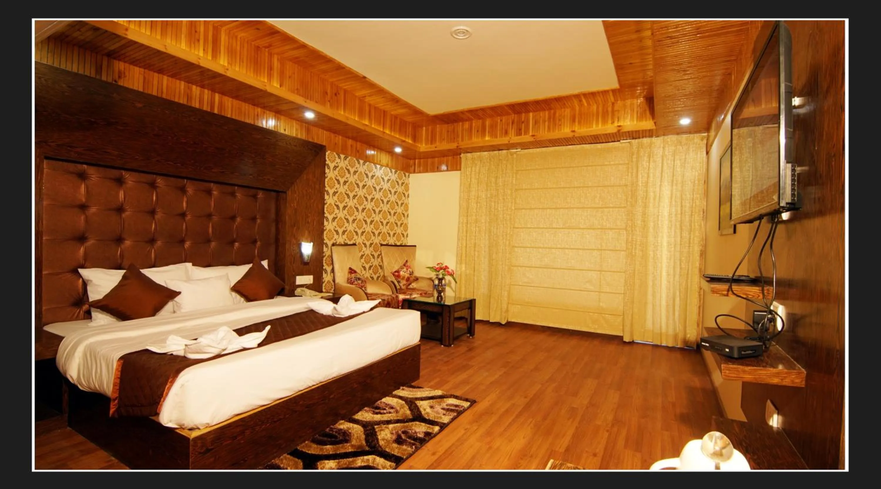 Bed in Grand Krisa Resort & SPA, Manali Experience Luxury With all Weather ACs in Every Room