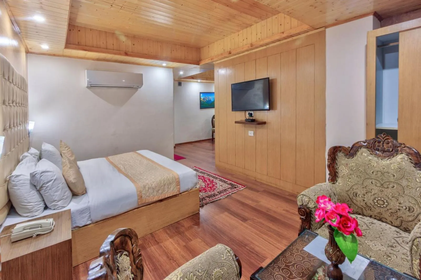 Bed in Grand Krisa Resort & SPA, Manali Experience Luxury With all Weather ACs in Every Room