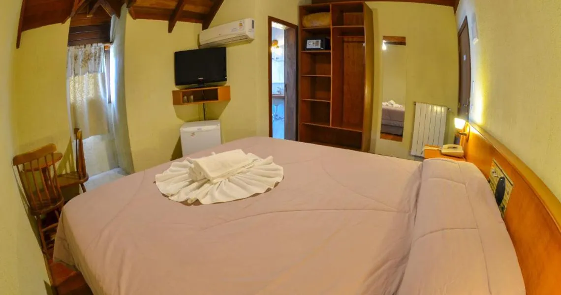 Bed in Hotel Aconchego da Serra