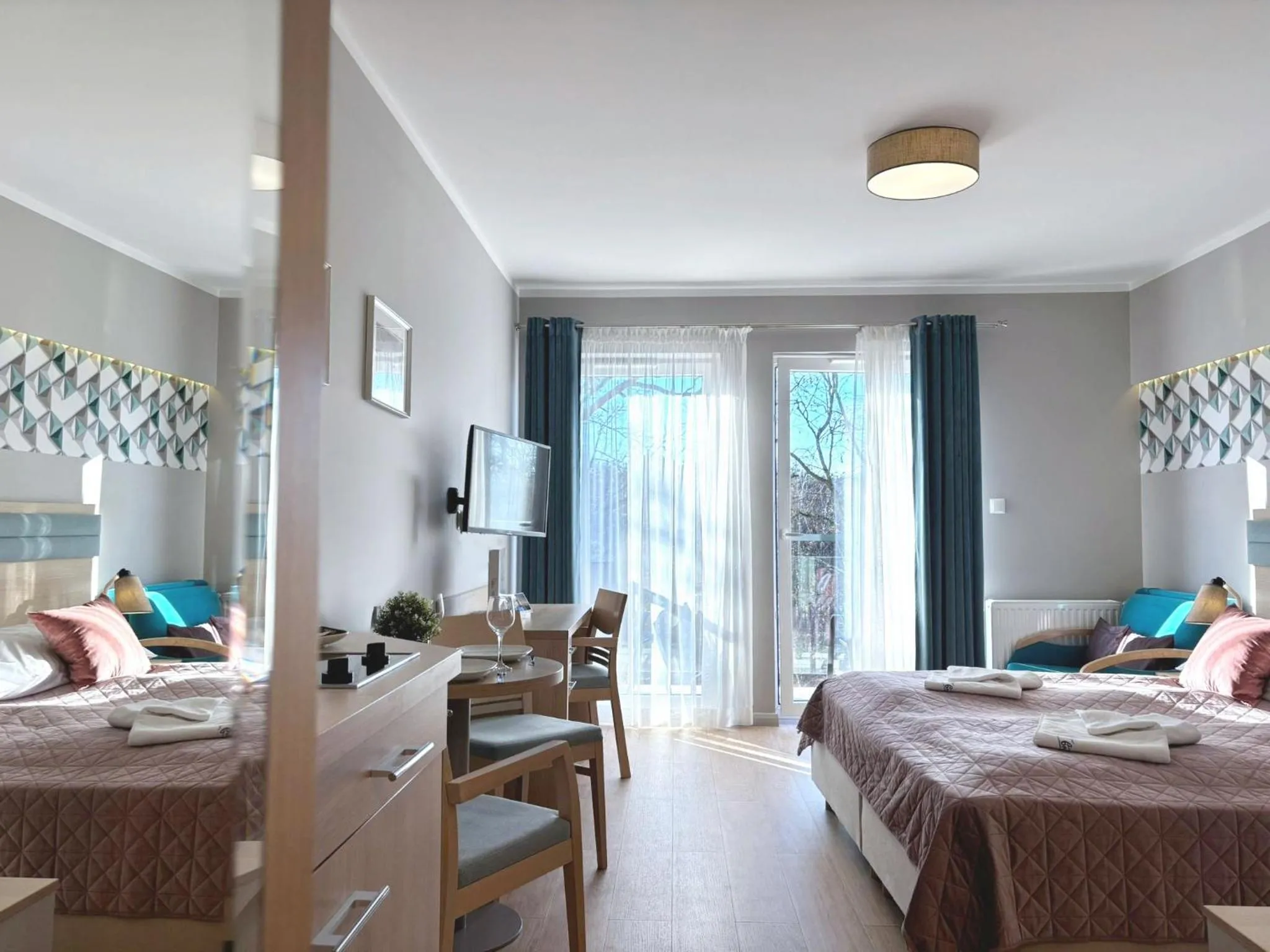 Bed in Osiedle Cesarskie Apartamenty - Parking - Apartamenty Bryza