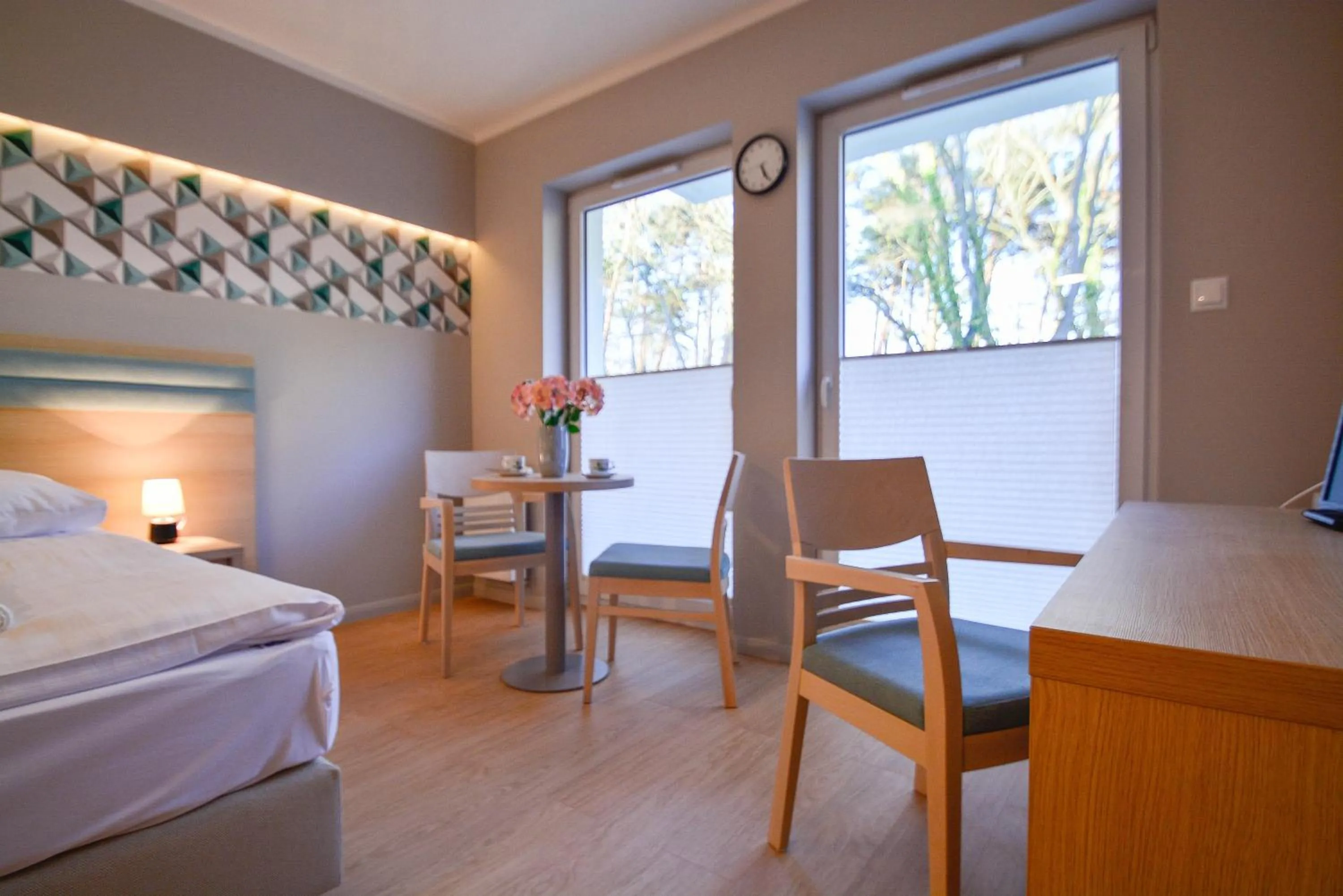 Seating area, Bed in Osiedle Cesarskie Apartamenty - Parking - Apartamenty Bryza