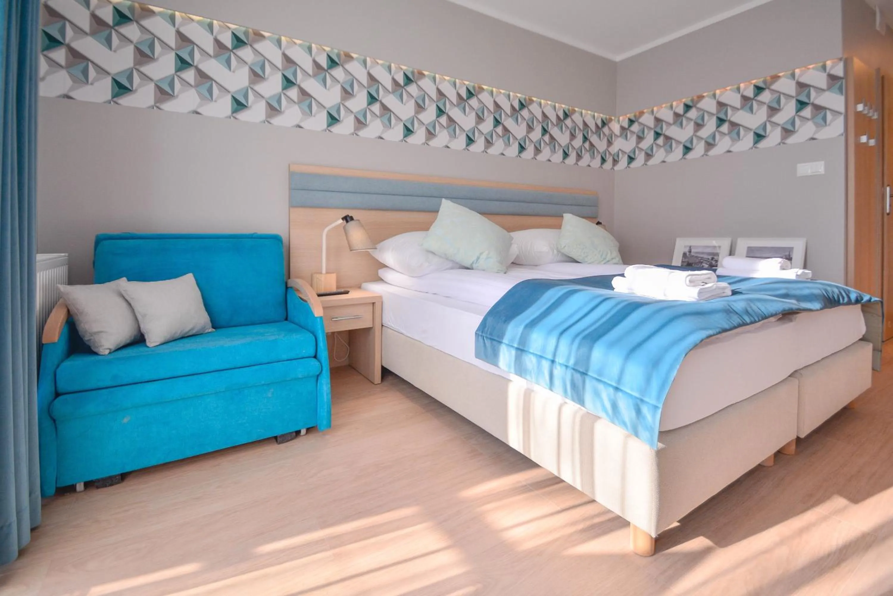 Bed in Osiedle Cesarskie Apartamenty - Parking - Apartamenty Bryza