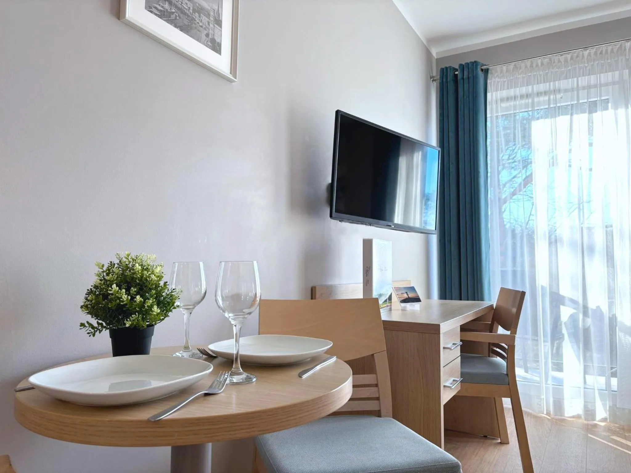 TV and multimedia in Osiedle Cesarskie Apartamenty - Parking - Apartamenty Bryza