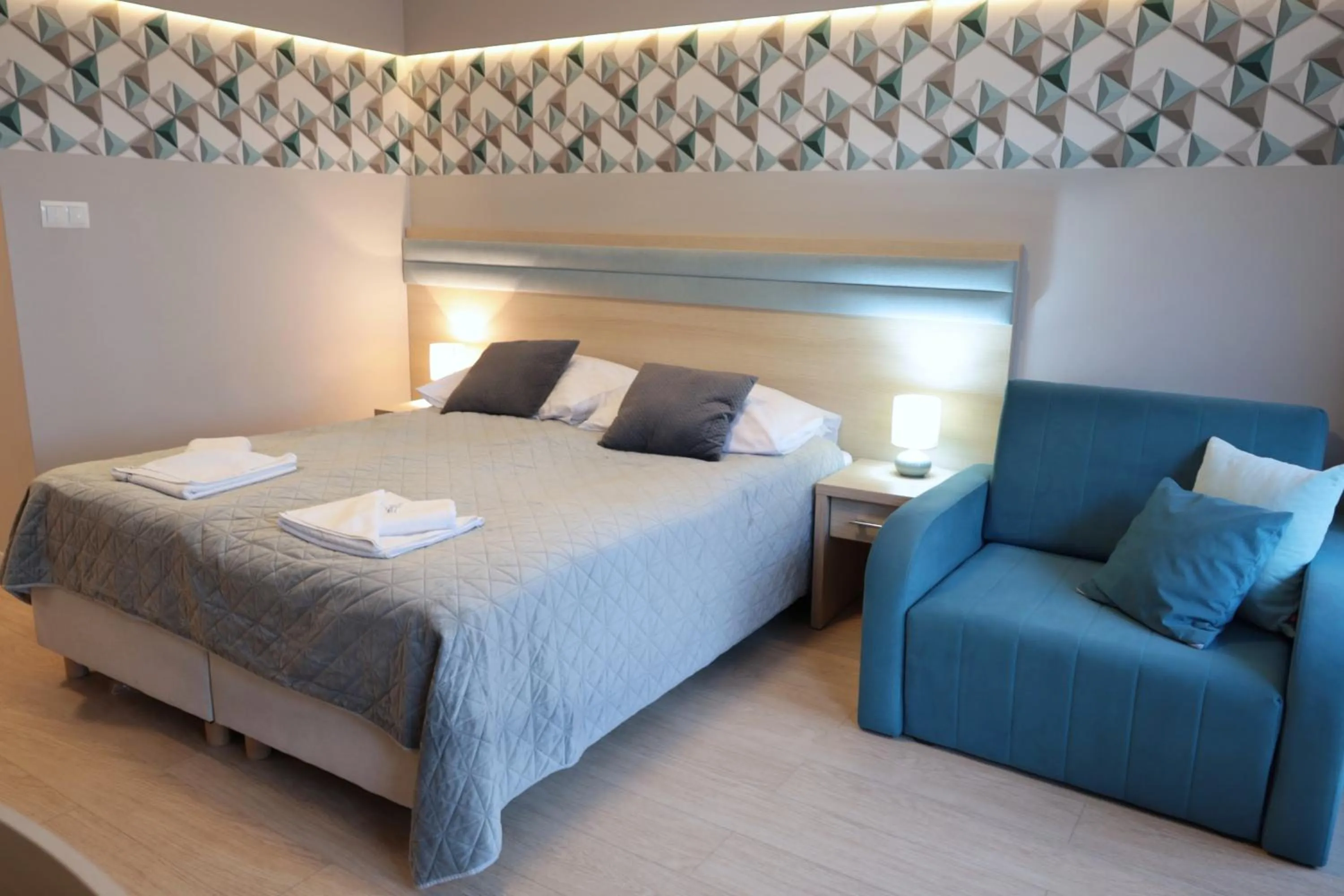 Bed in Osiedle Cesarskie Apartamenty - Parking - Apartamenty Bryza