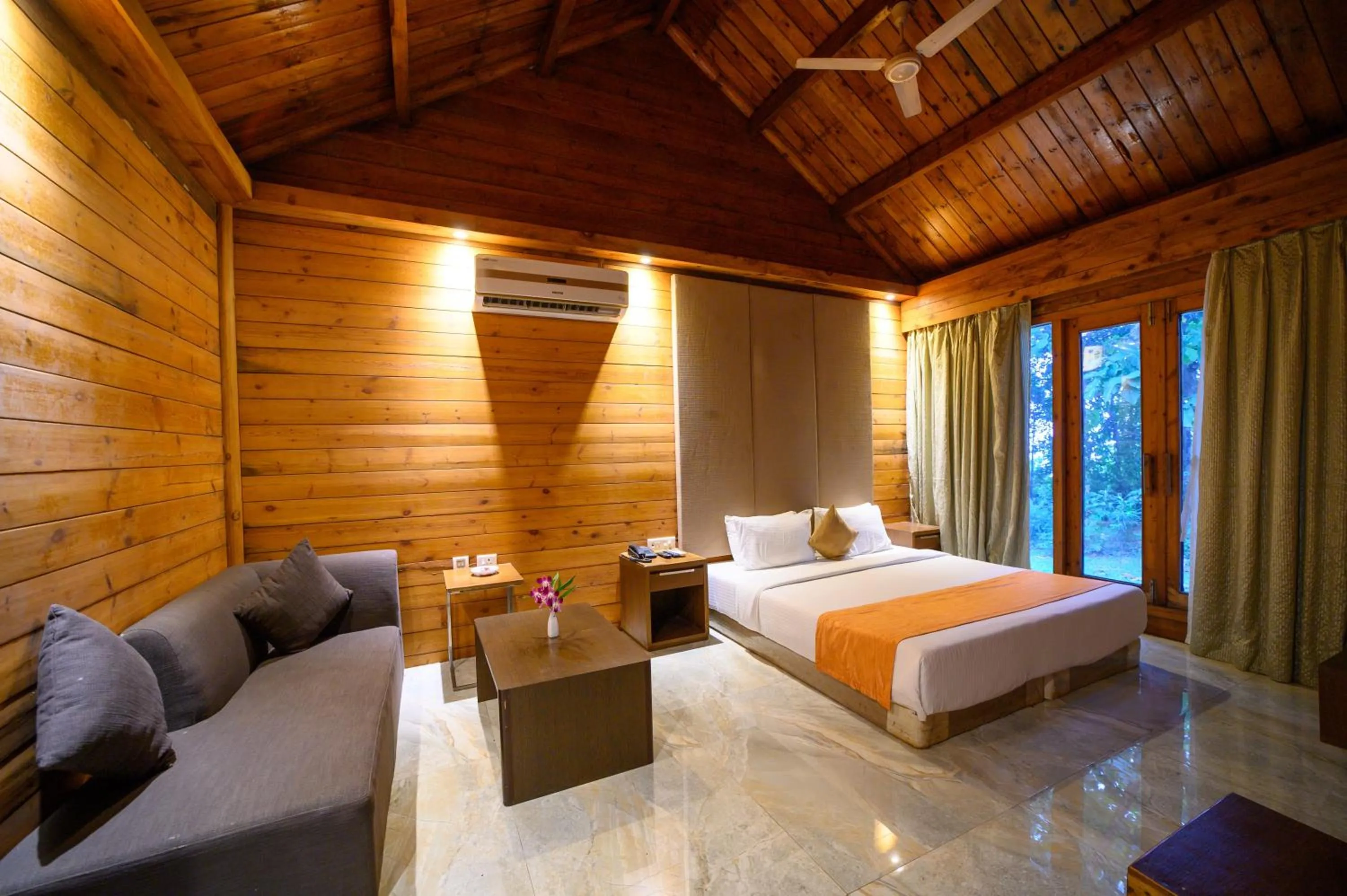 Seating area, Bed in Sinclairs Retreat Dooars, Chalsa