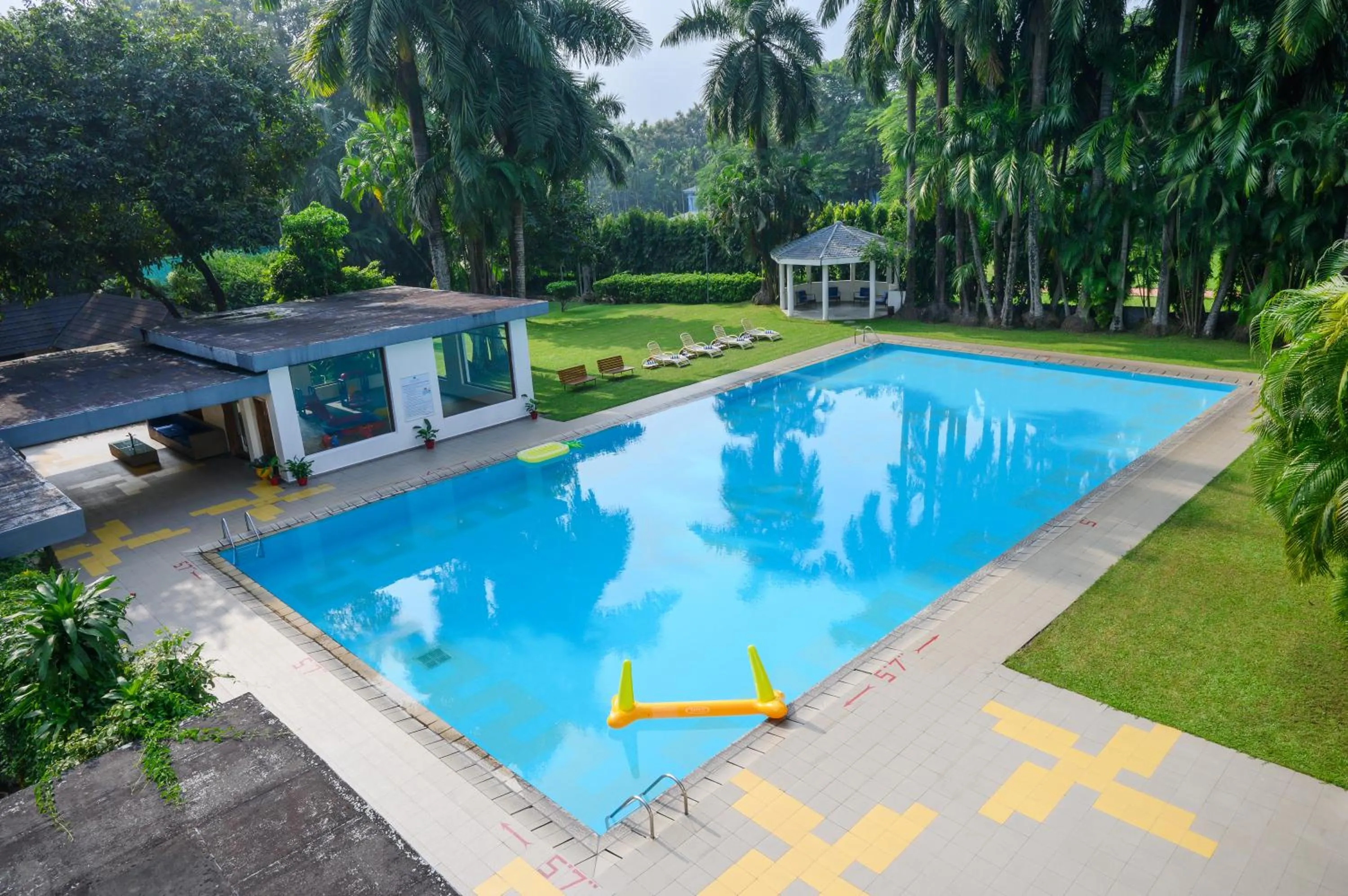 Swimming pool in Sinclairs Retreat Dooars, Chalsa
