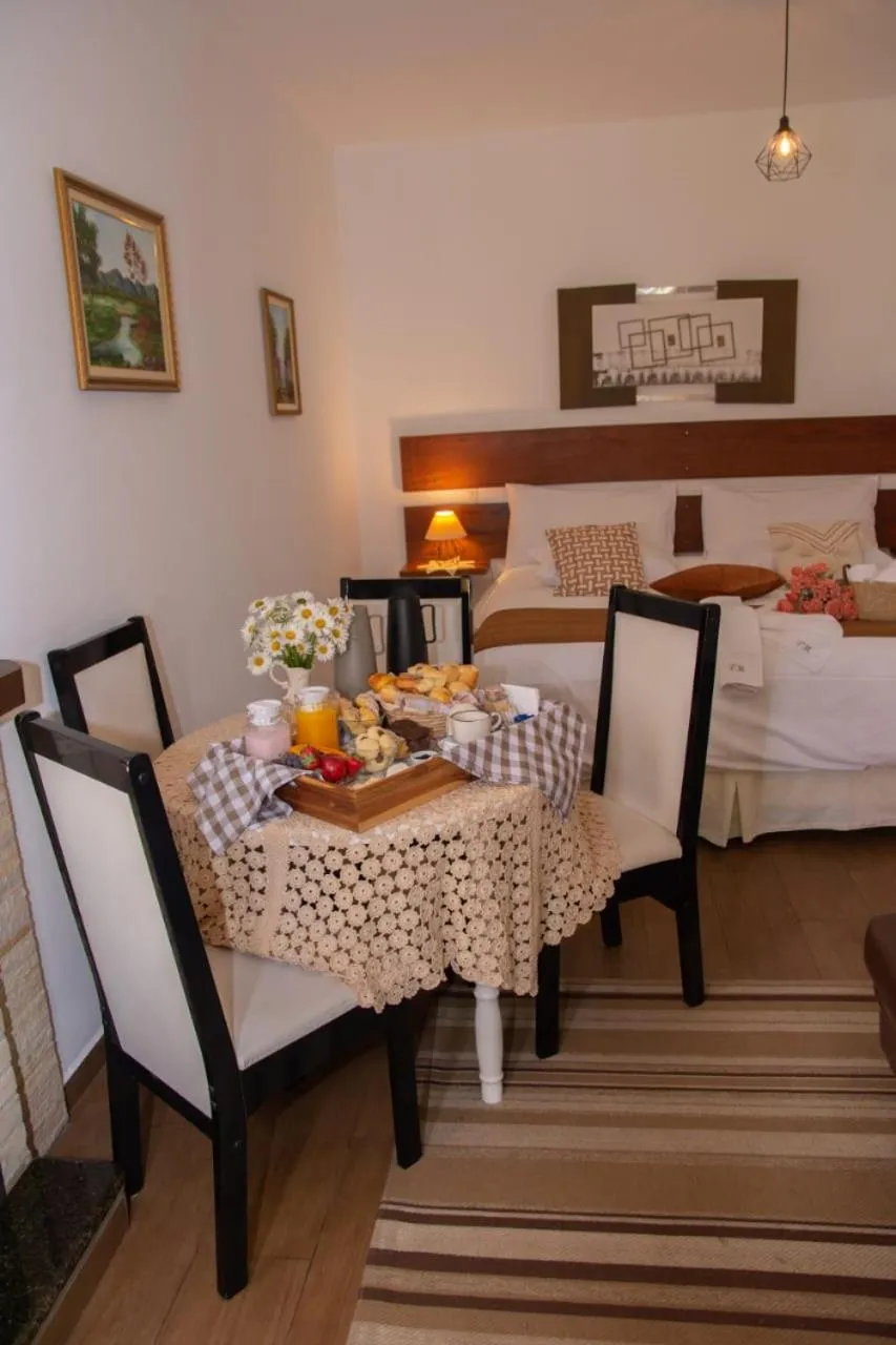 Bed in Pousada Medeiros