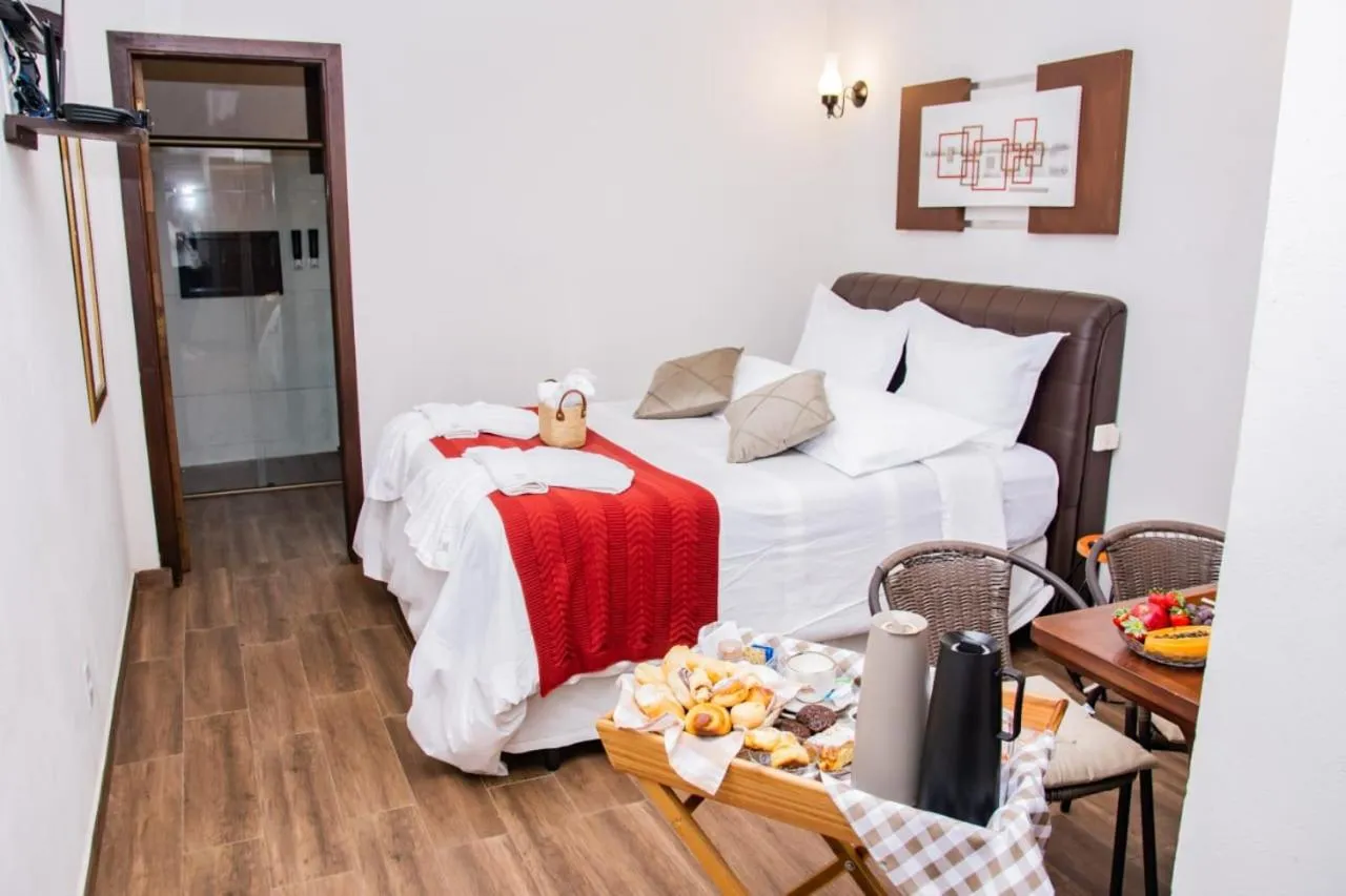 Bed in Pousada Medeiros