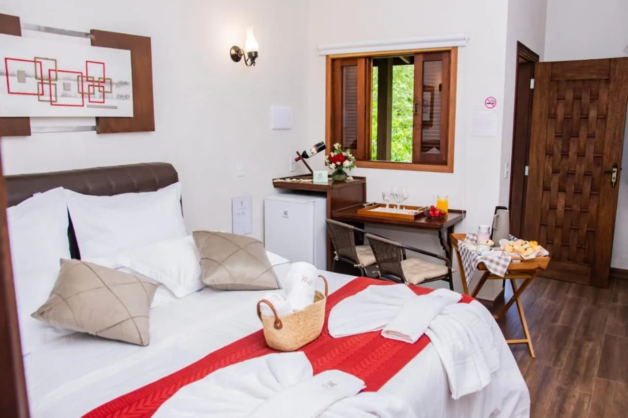 Bed in Pousada Medeiros