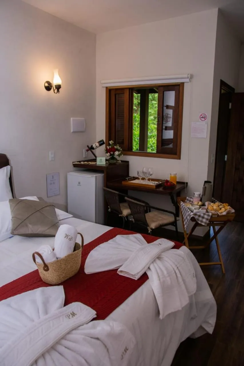 Bed in Pousada Medeiros