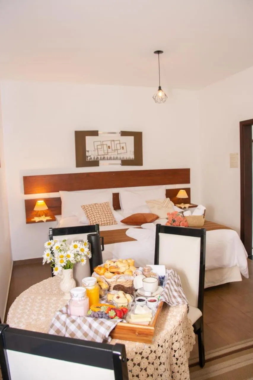 Bed in Pousada Medeiros