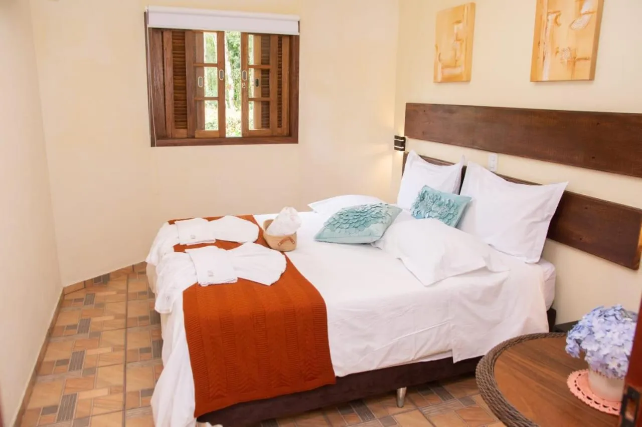 Bed in Pousada Medeiros