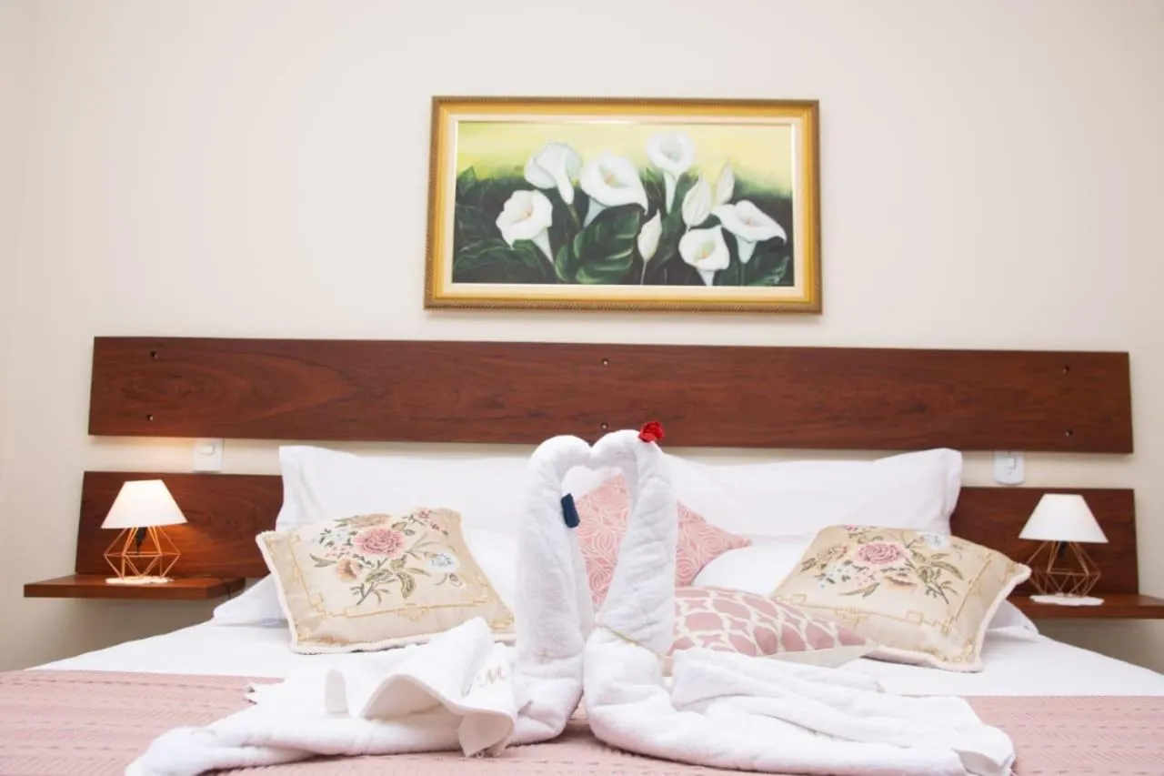 Bed in Pousada Medeiros