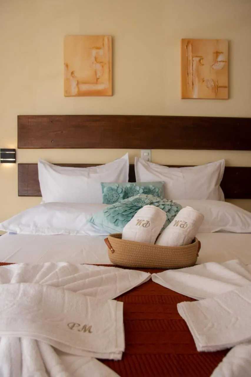 Bed in Pousada Medeiros