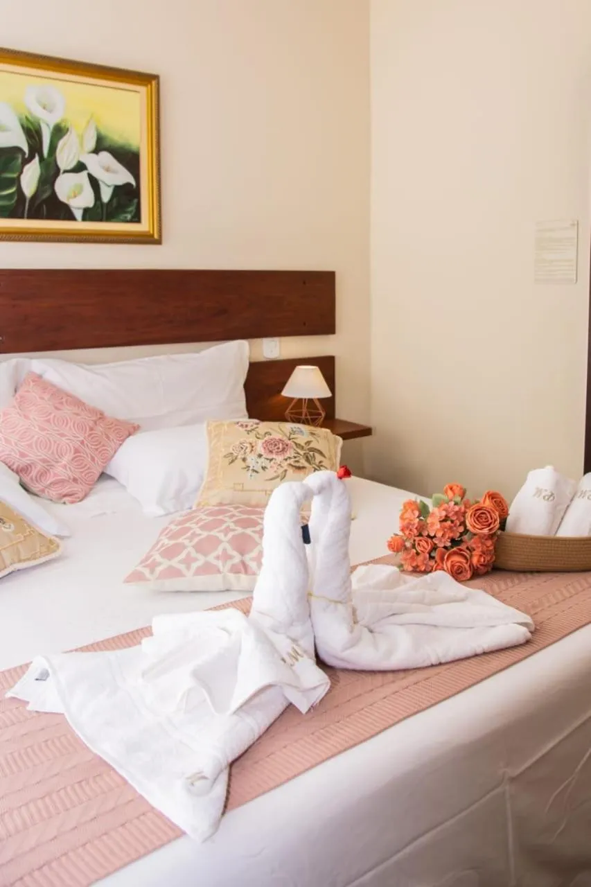 Bed in Pousada Medeiros