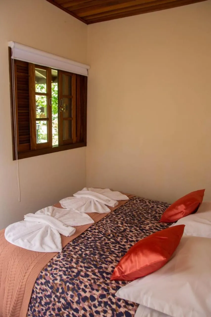 Bed in Pousada Medeiros
