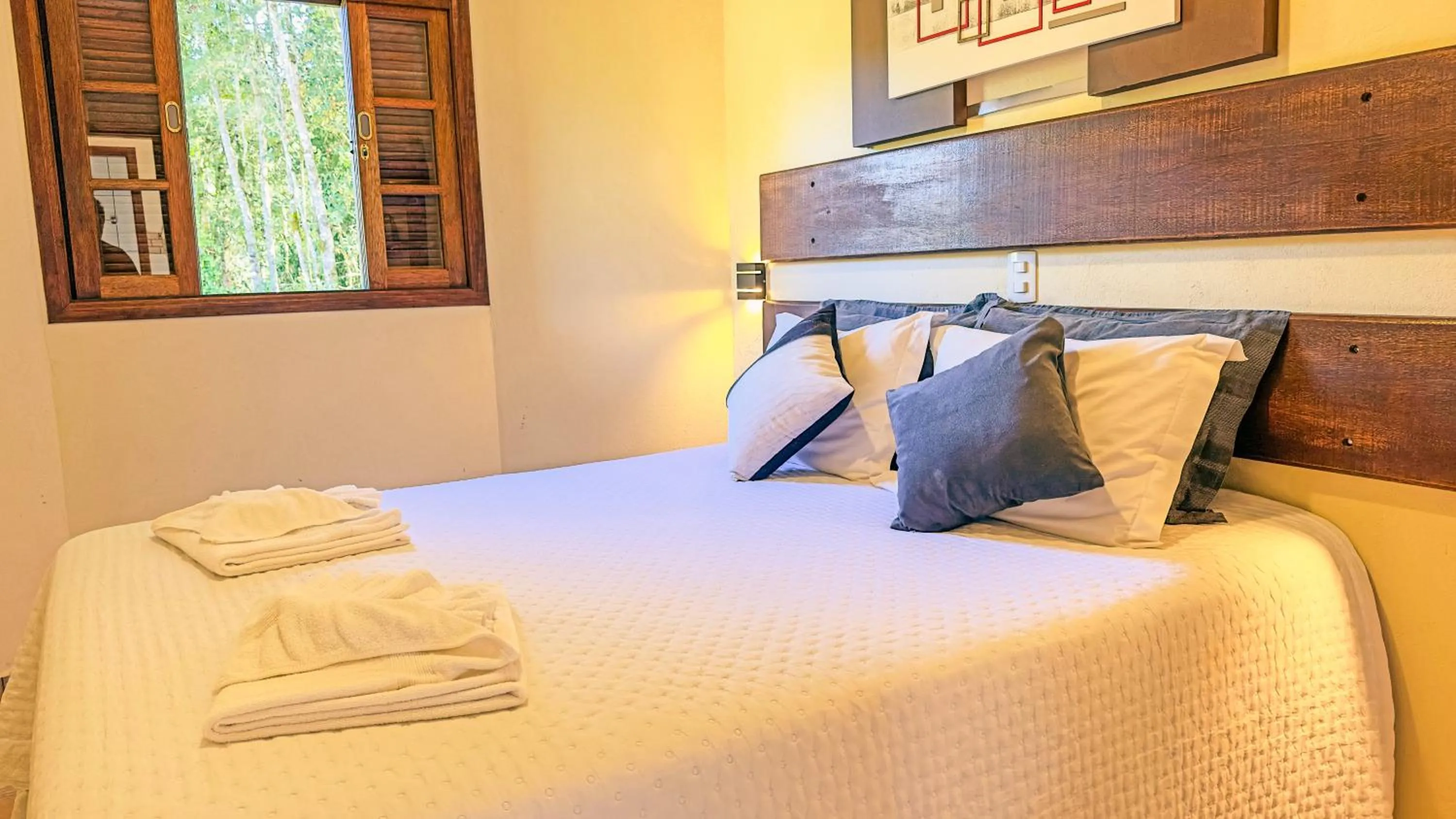 View (from property/room), Bed in Pousada Medeiros