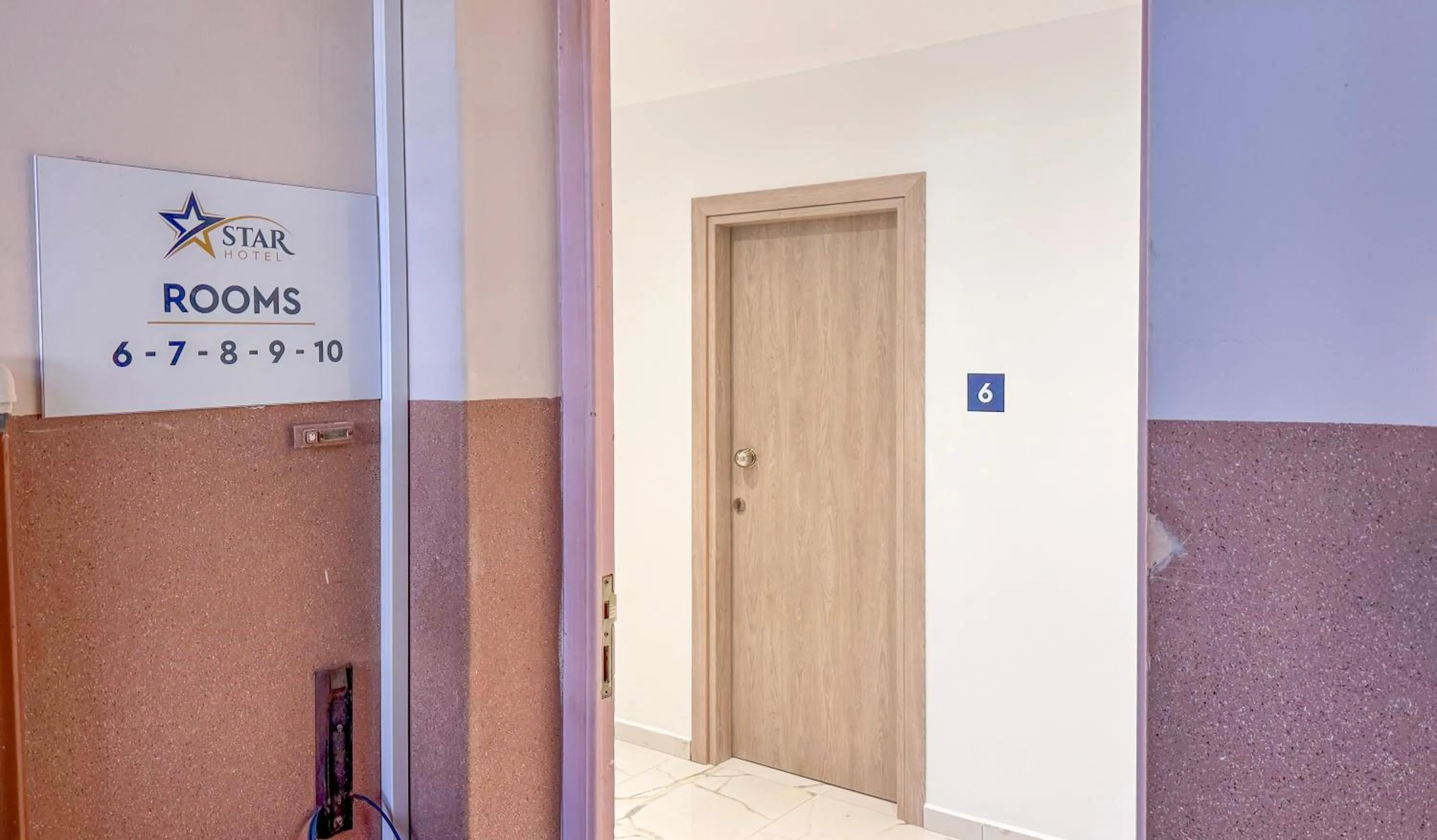 Property logo or sign in Star Hotel