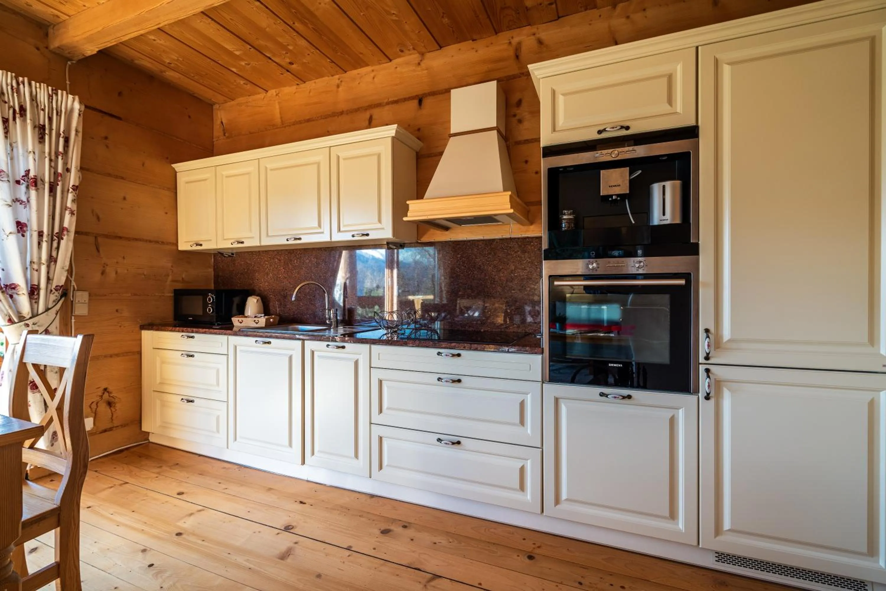 Kitchen or kitchenette in Osada Kościelisko - Tatry na Wyciągnięcie Ręki