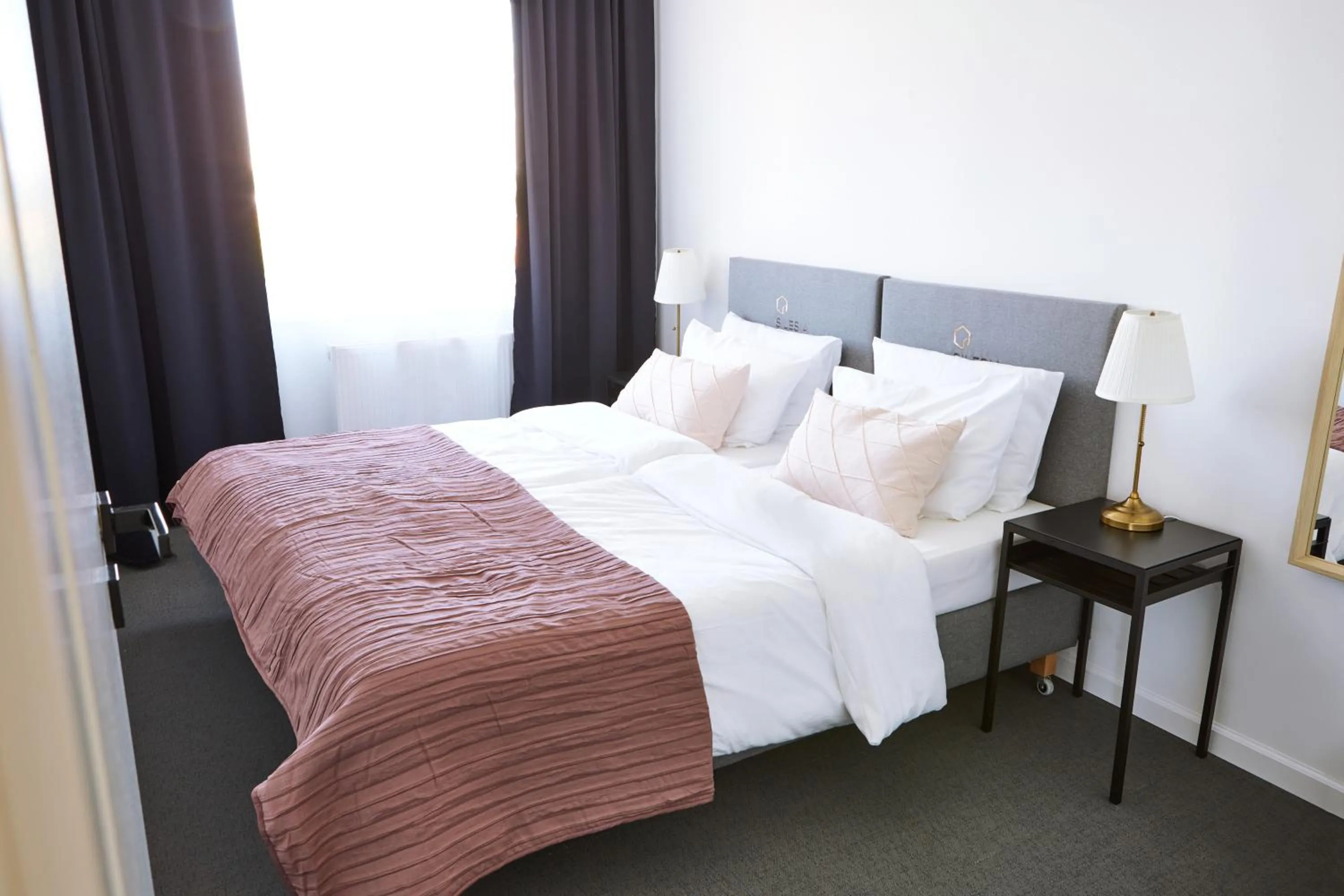 Bed in Silesia Apartments