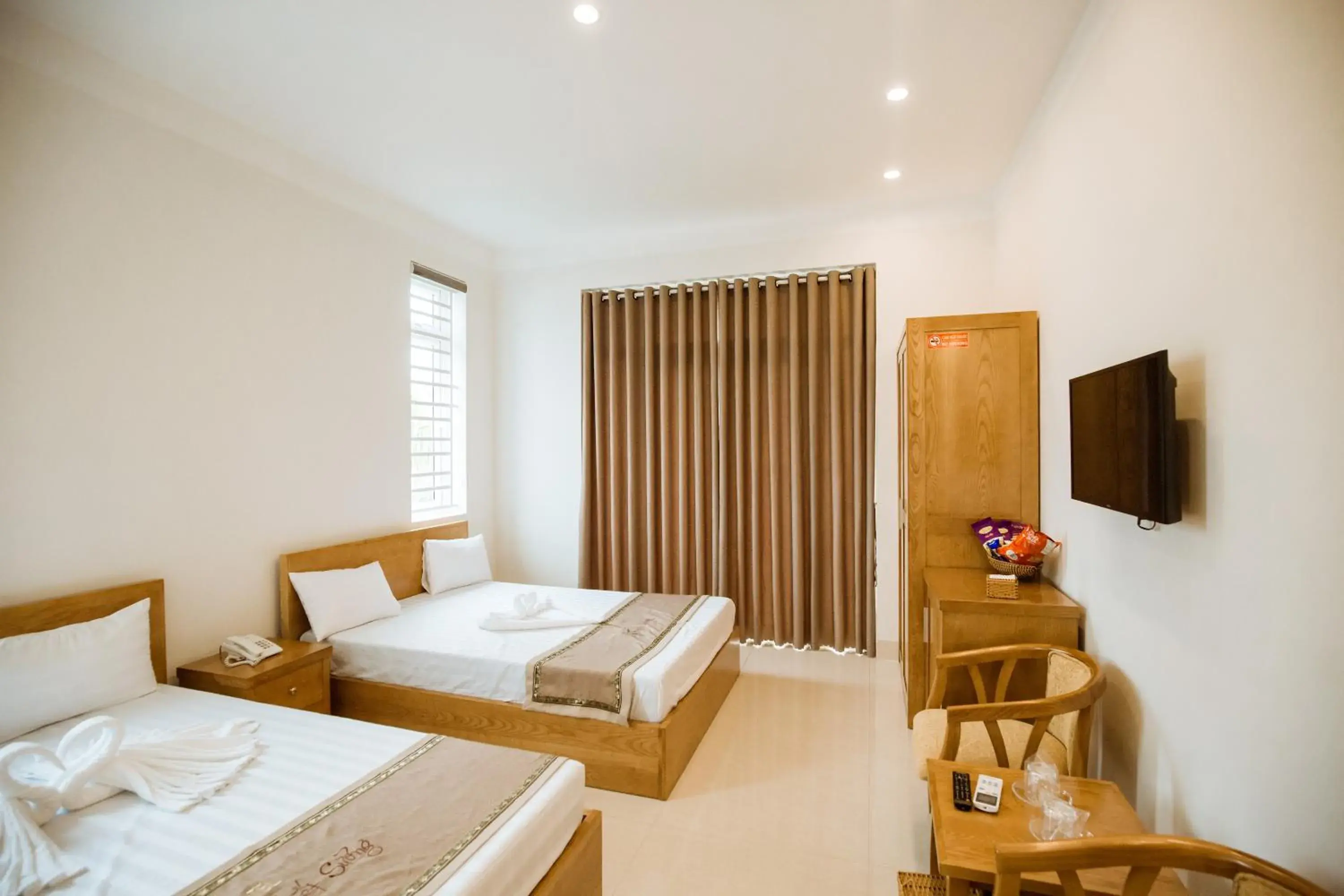 Bed in Tuyet Suong Villa Hotel Bed in Tuyet Suong Villa Hotel