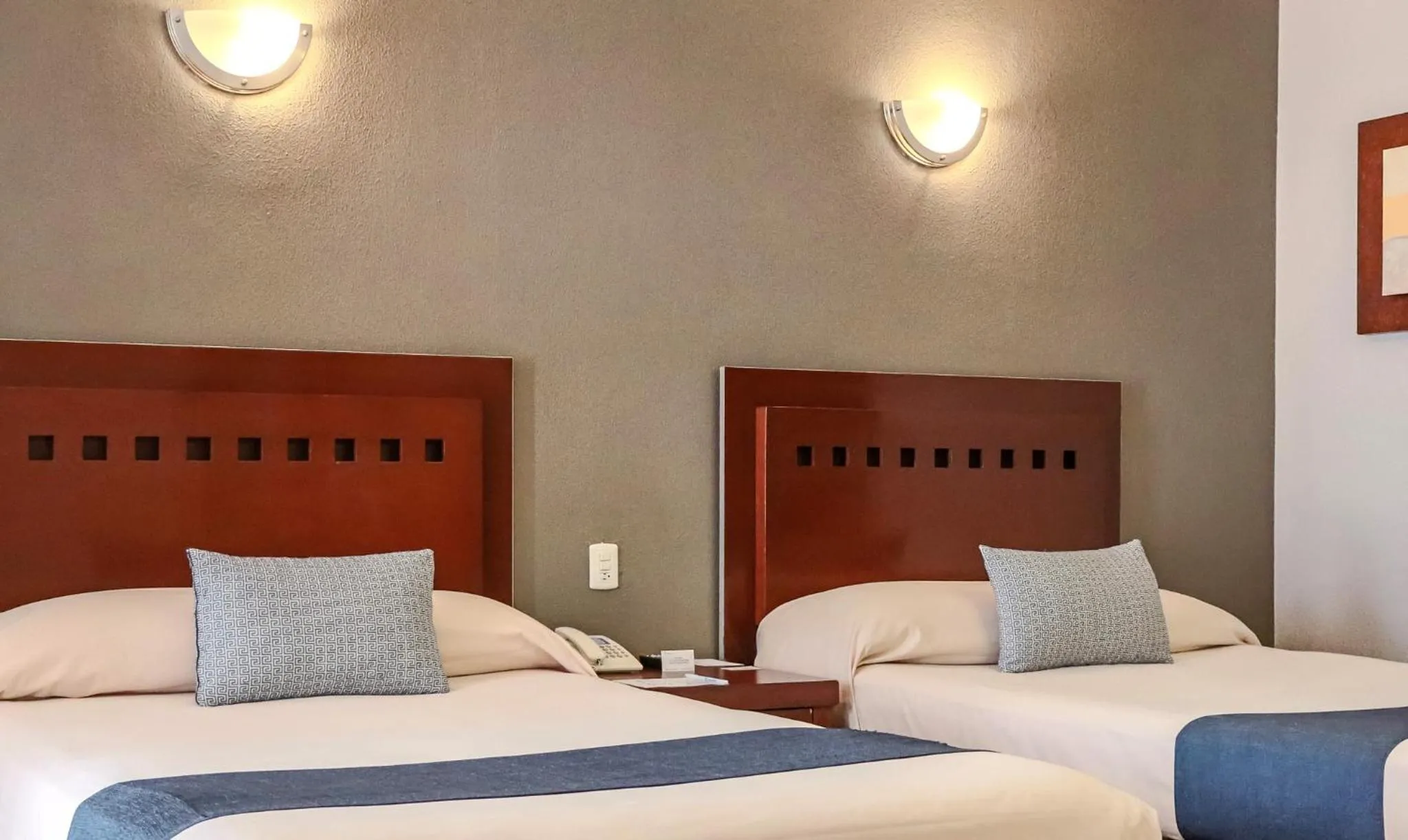 Bed in Hotel Panamerican