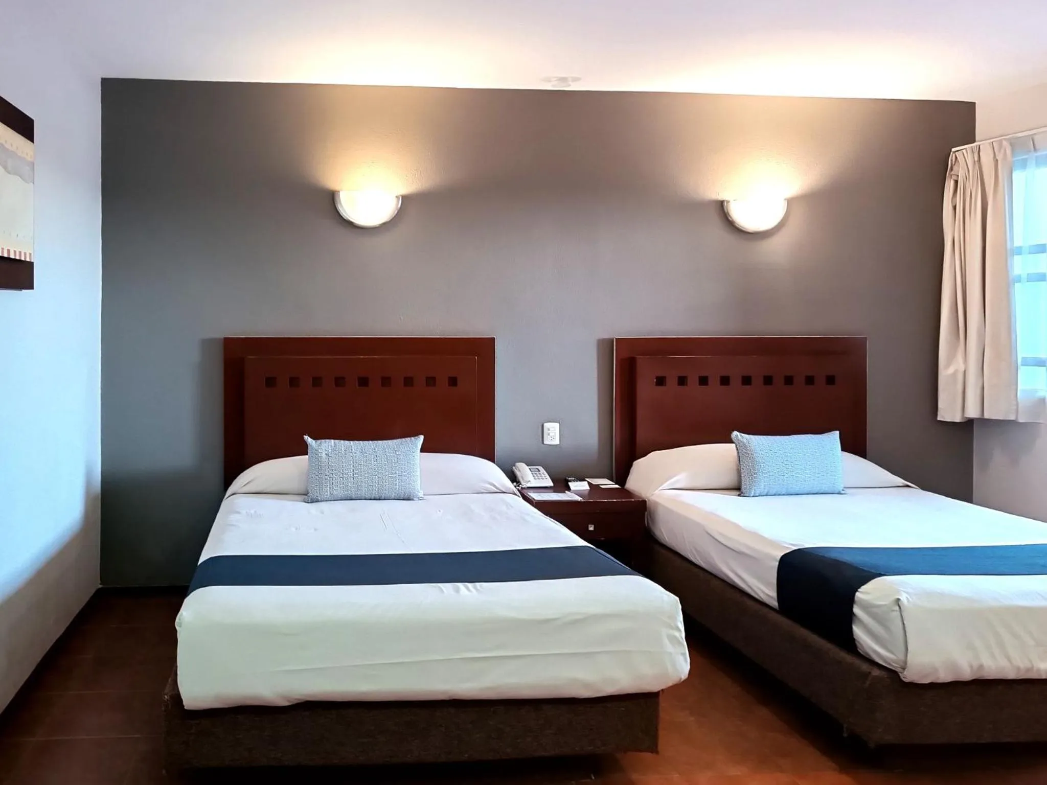 Bed in Hotel Panamerican