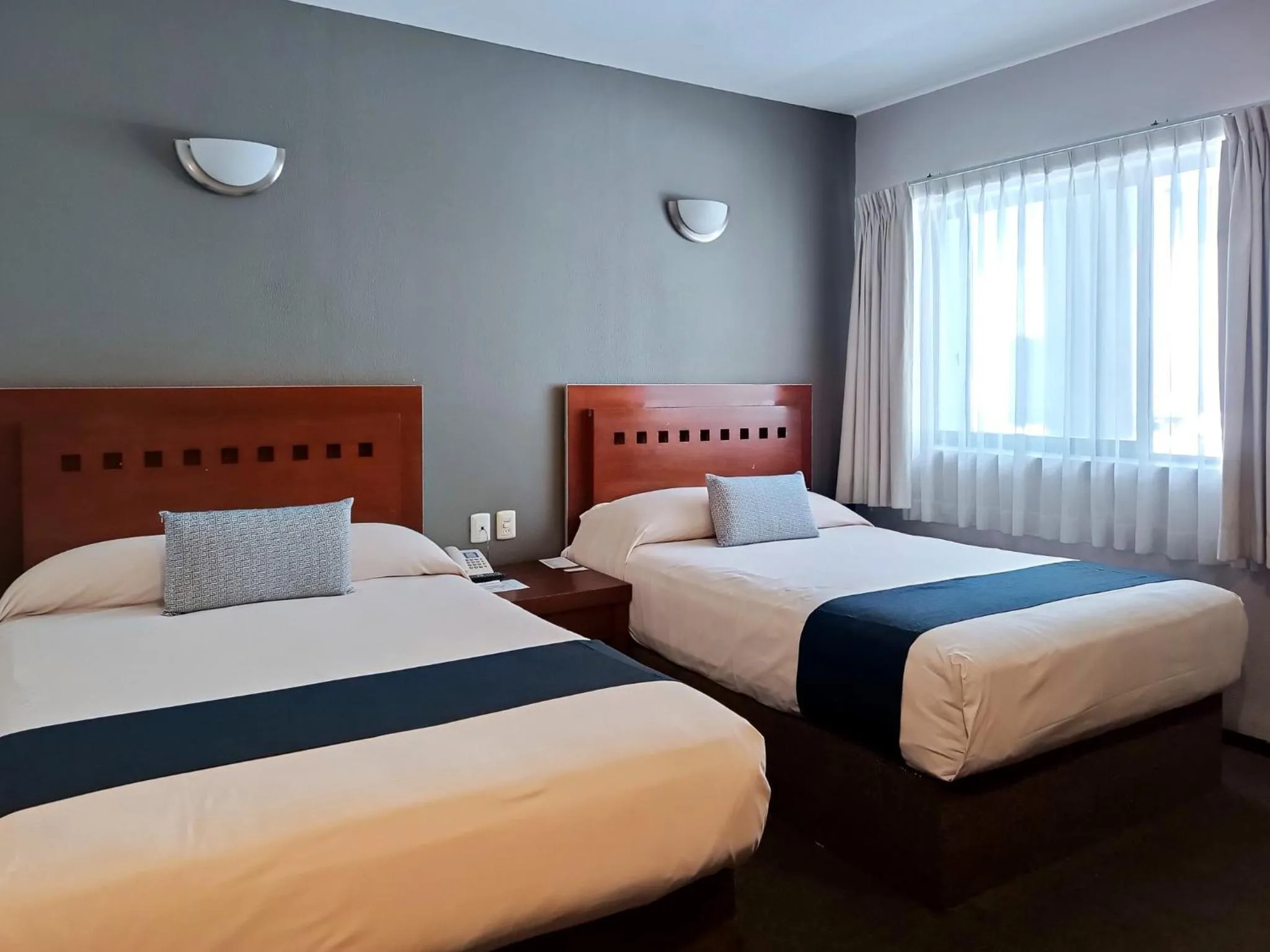 Bed in Hotel Panamerican