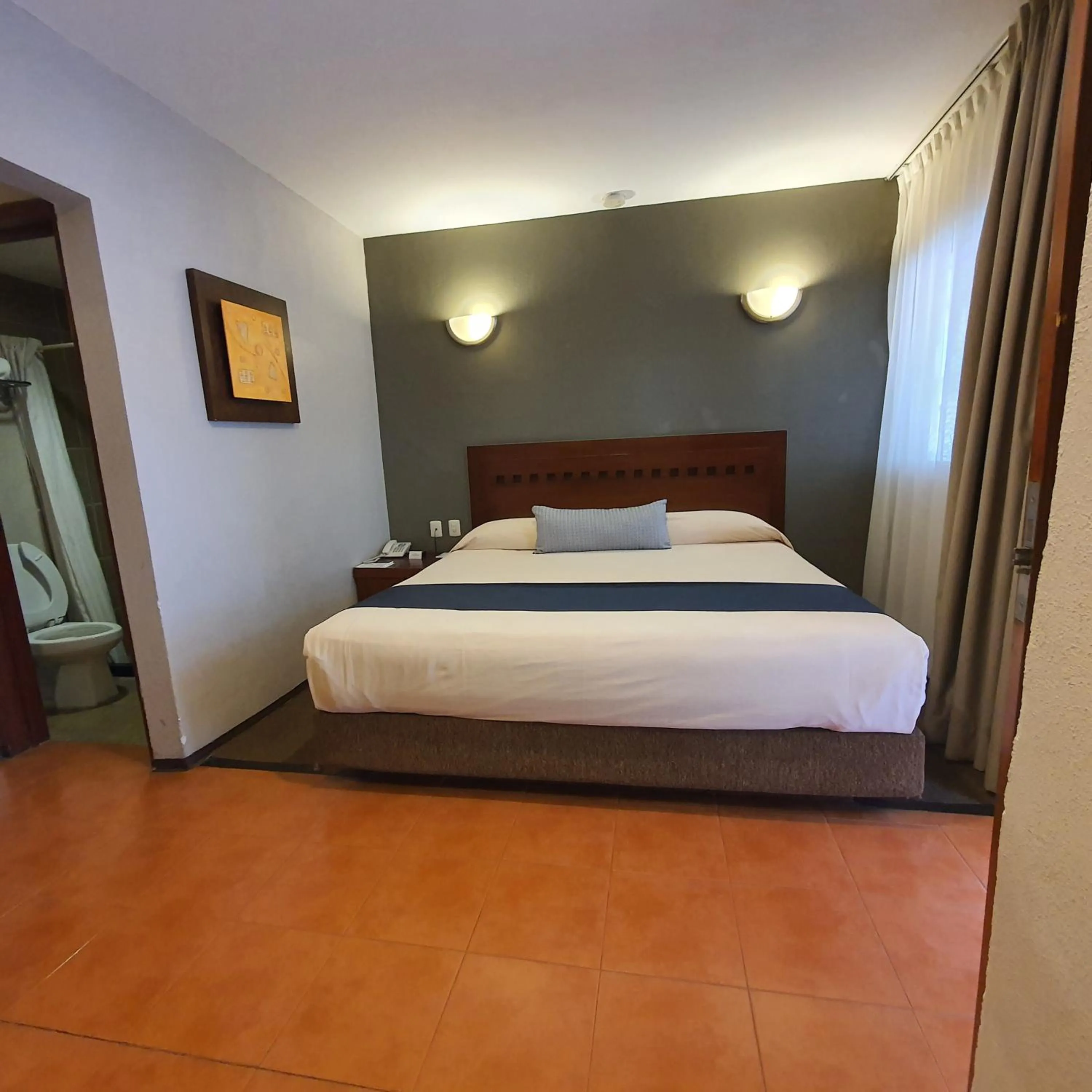 Bed in Hotel Panamerican