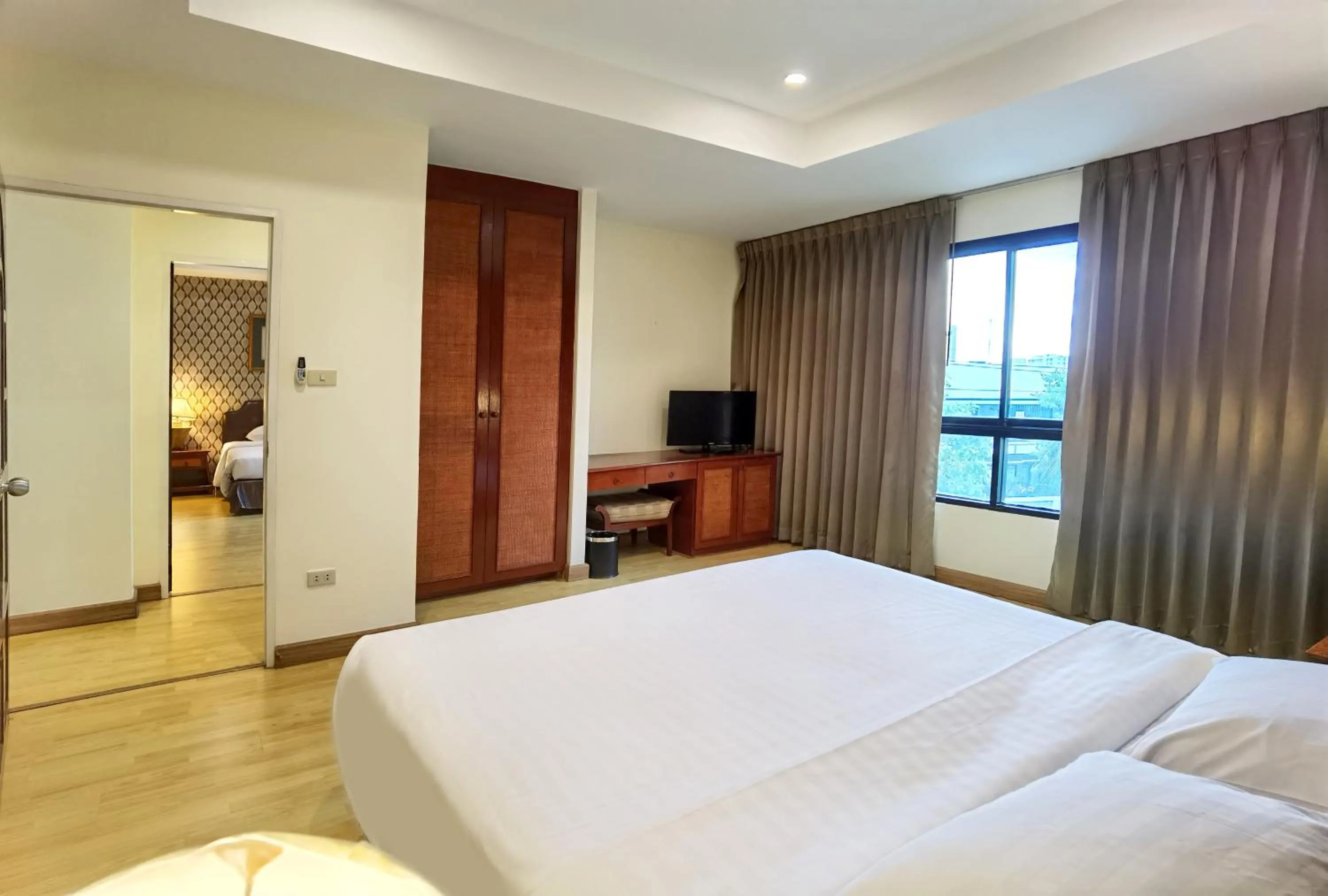 Bed in Nova Park Hotel Pattaya