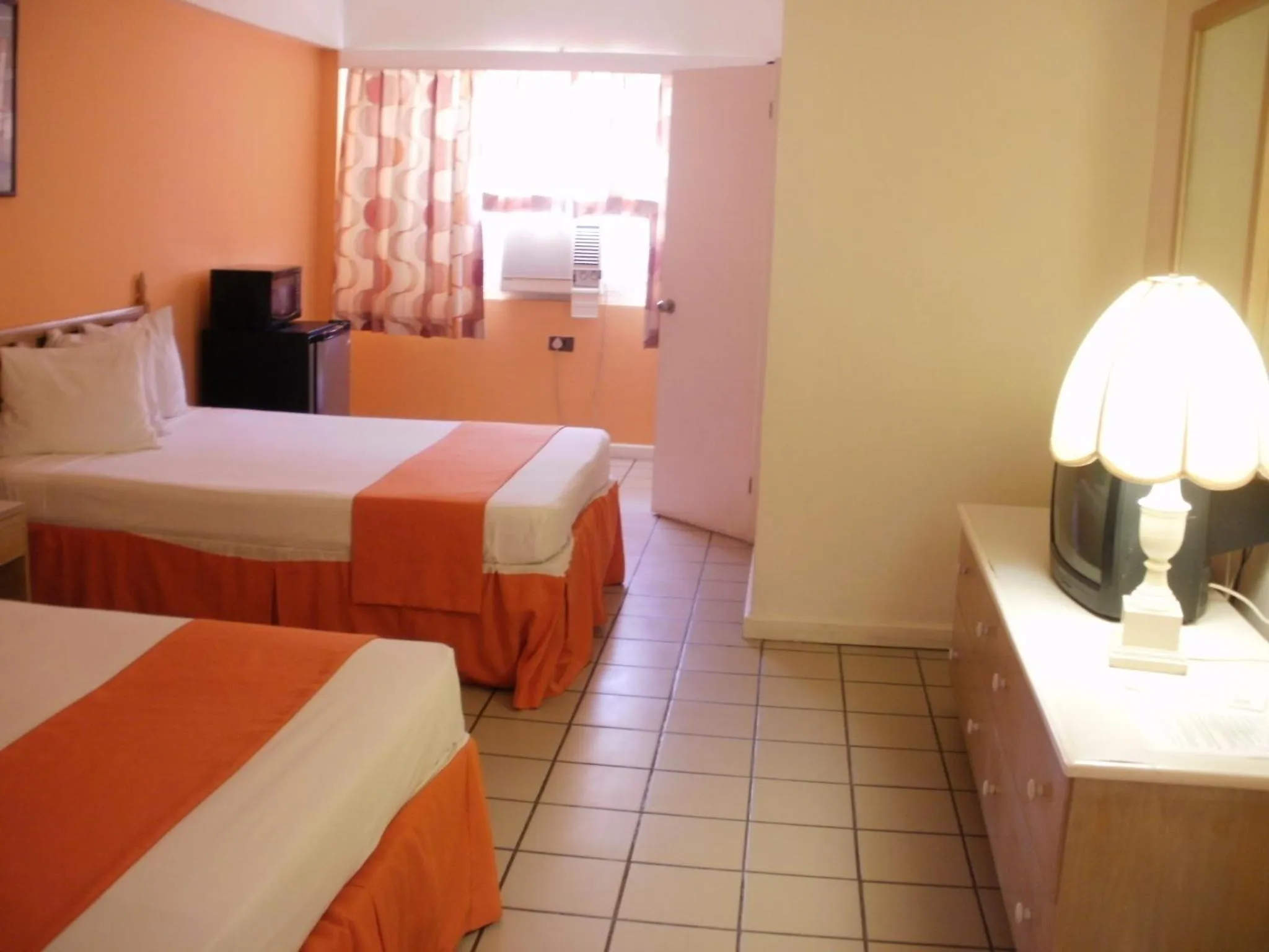 Photo of the whole room, Bed in Pineapple Court Hotel