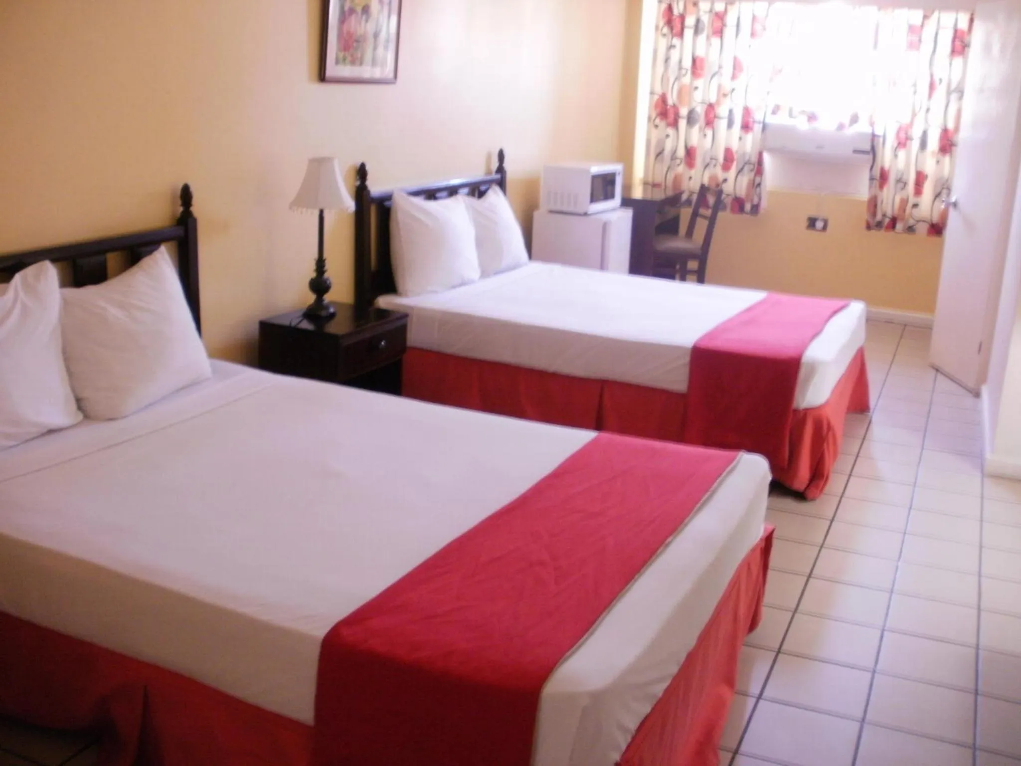 Photo of the whole room, Bed in Pineapple Court Hotel