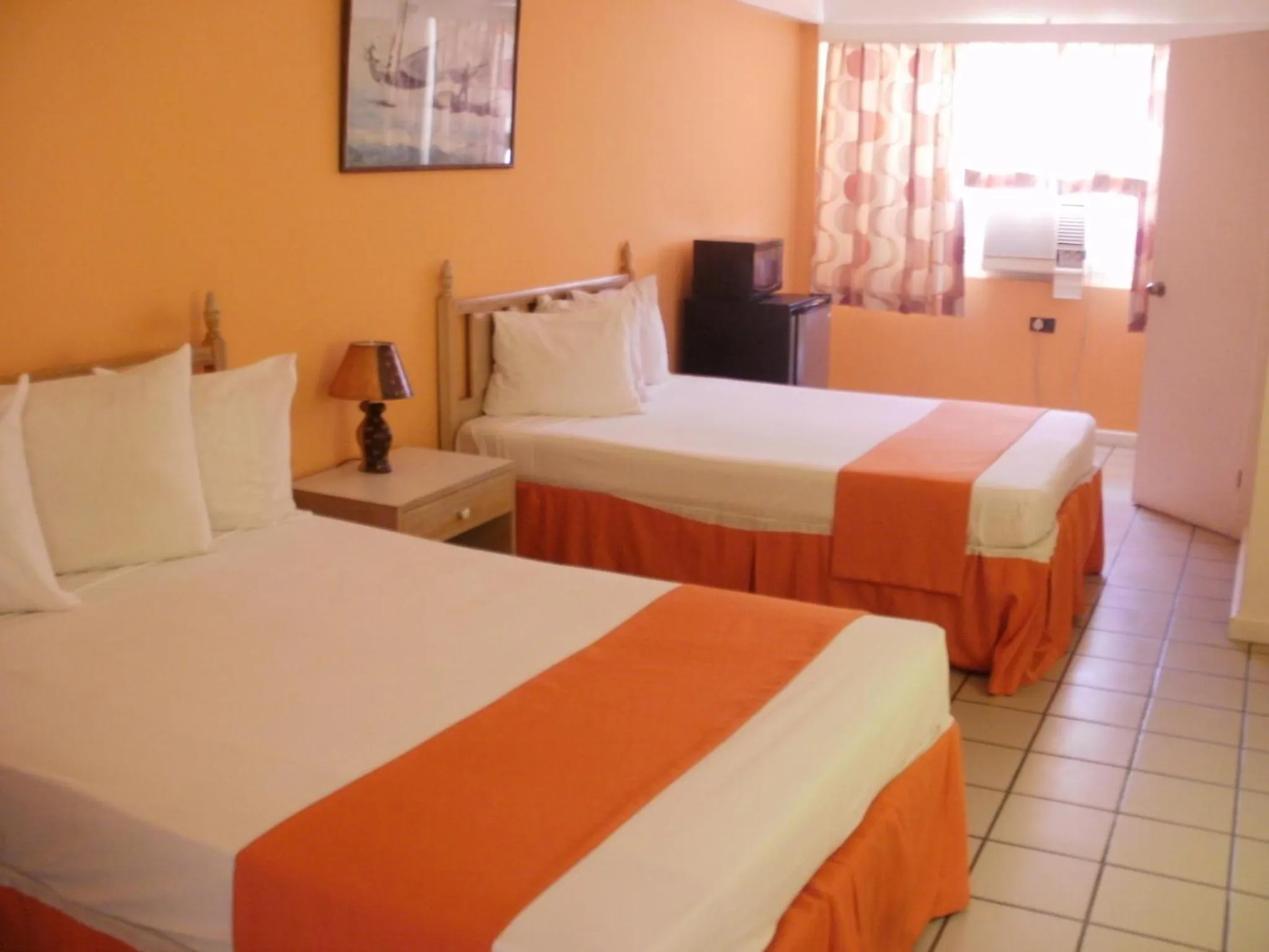 Photo of the whole room, Bed in Pineapple Court Hotel