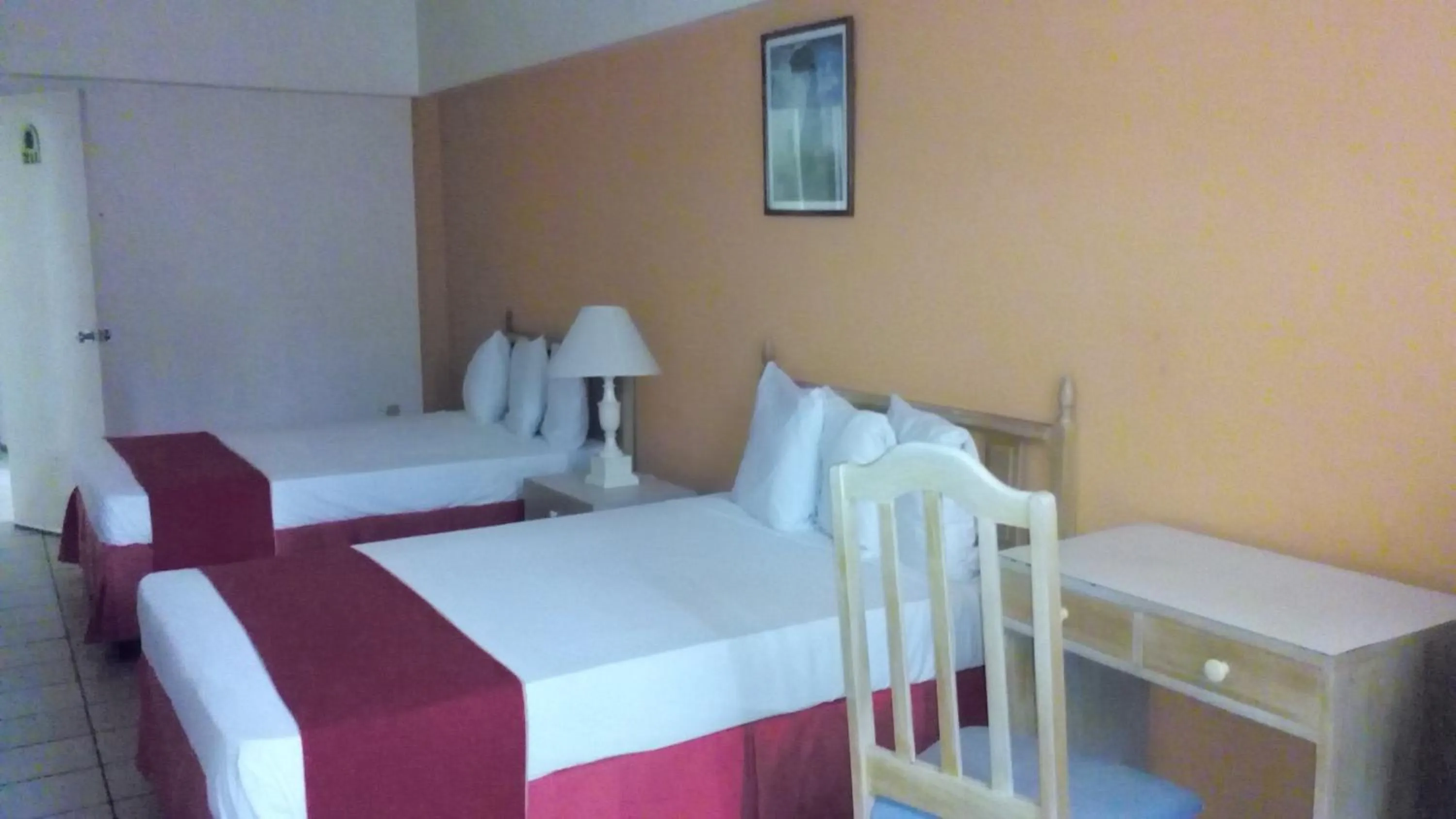 Photo of the whole room, Bed in Pineapple Court Hotel