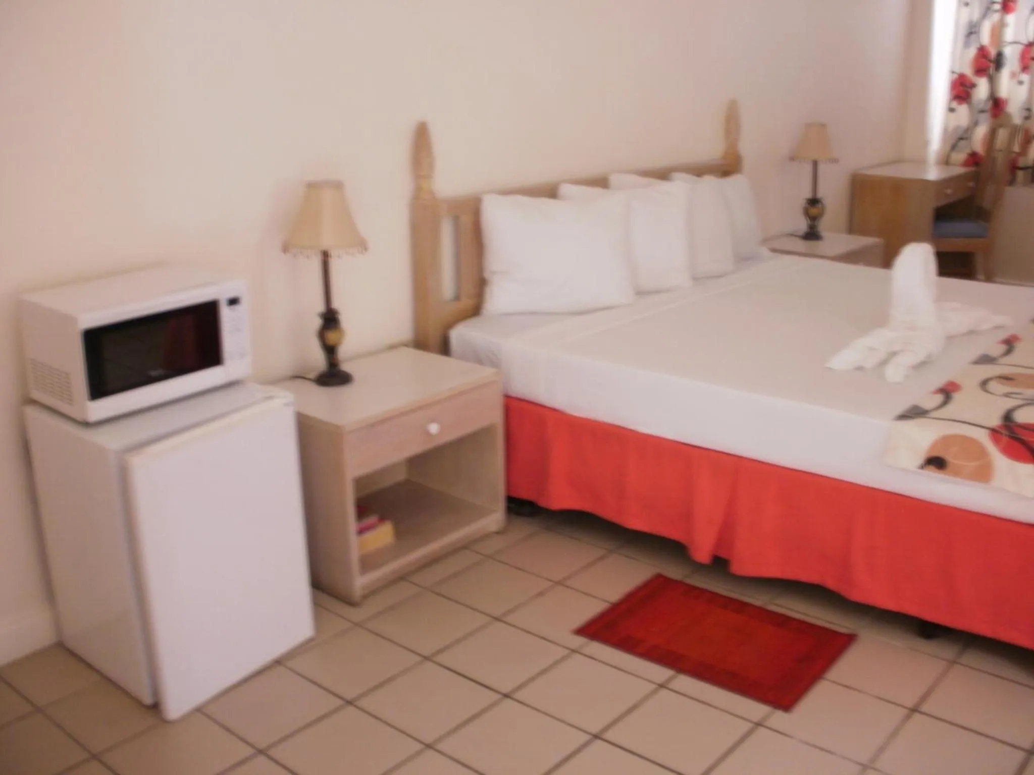 Photo of the whole room, Bed in Pineapple Court Hotel