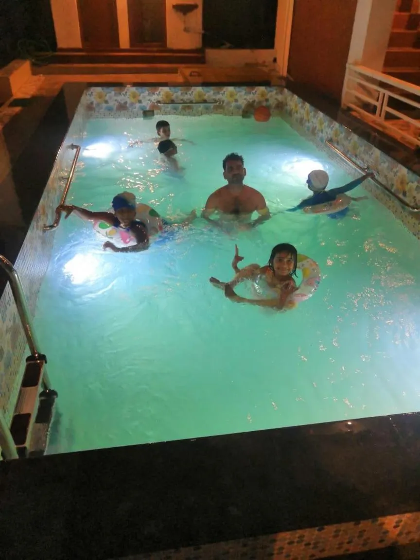 Swimming pool in Redstone House by Oxystays Hospitality