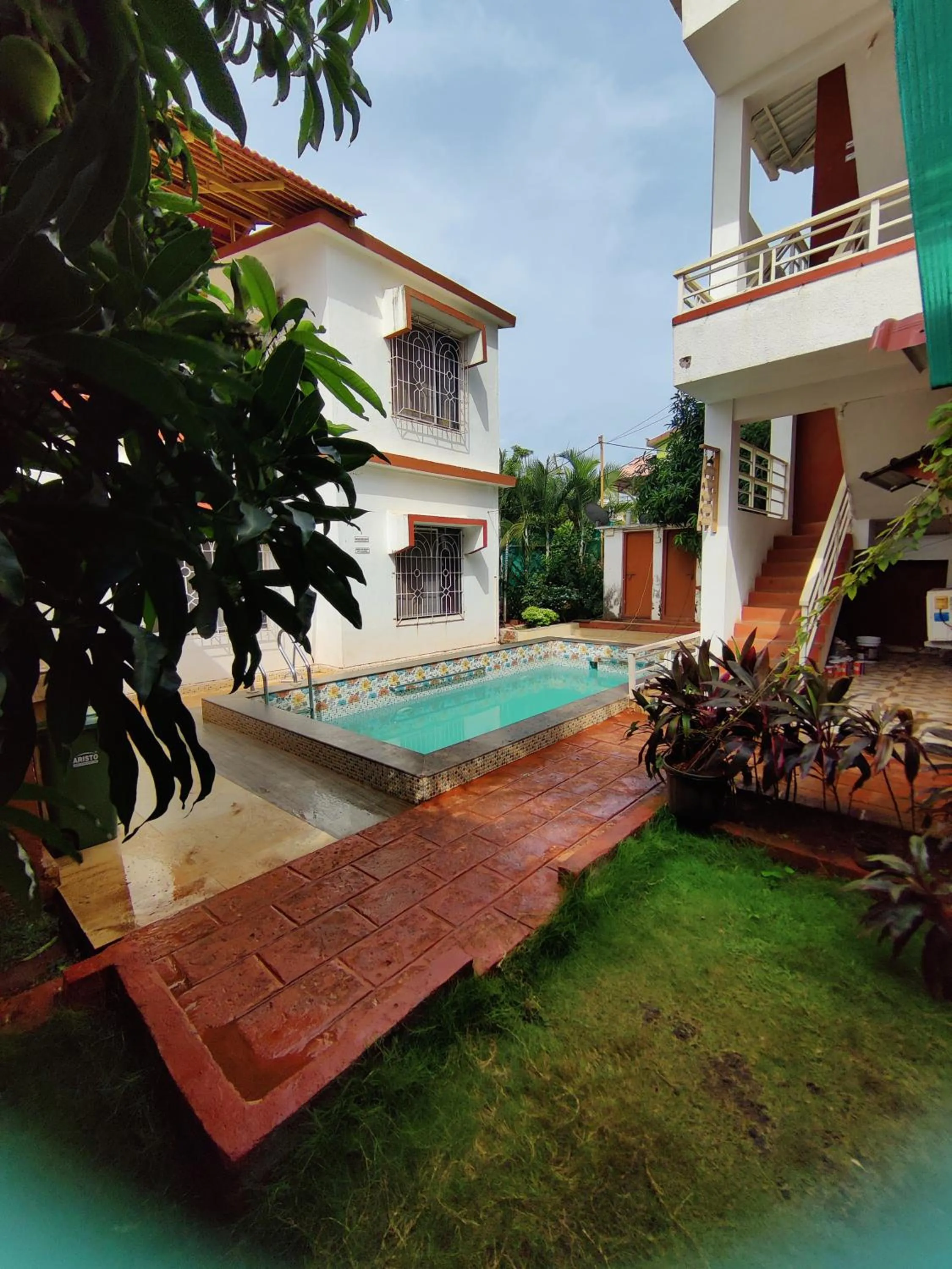 Swimming pool in Redstone House by Oxystays Hospitality