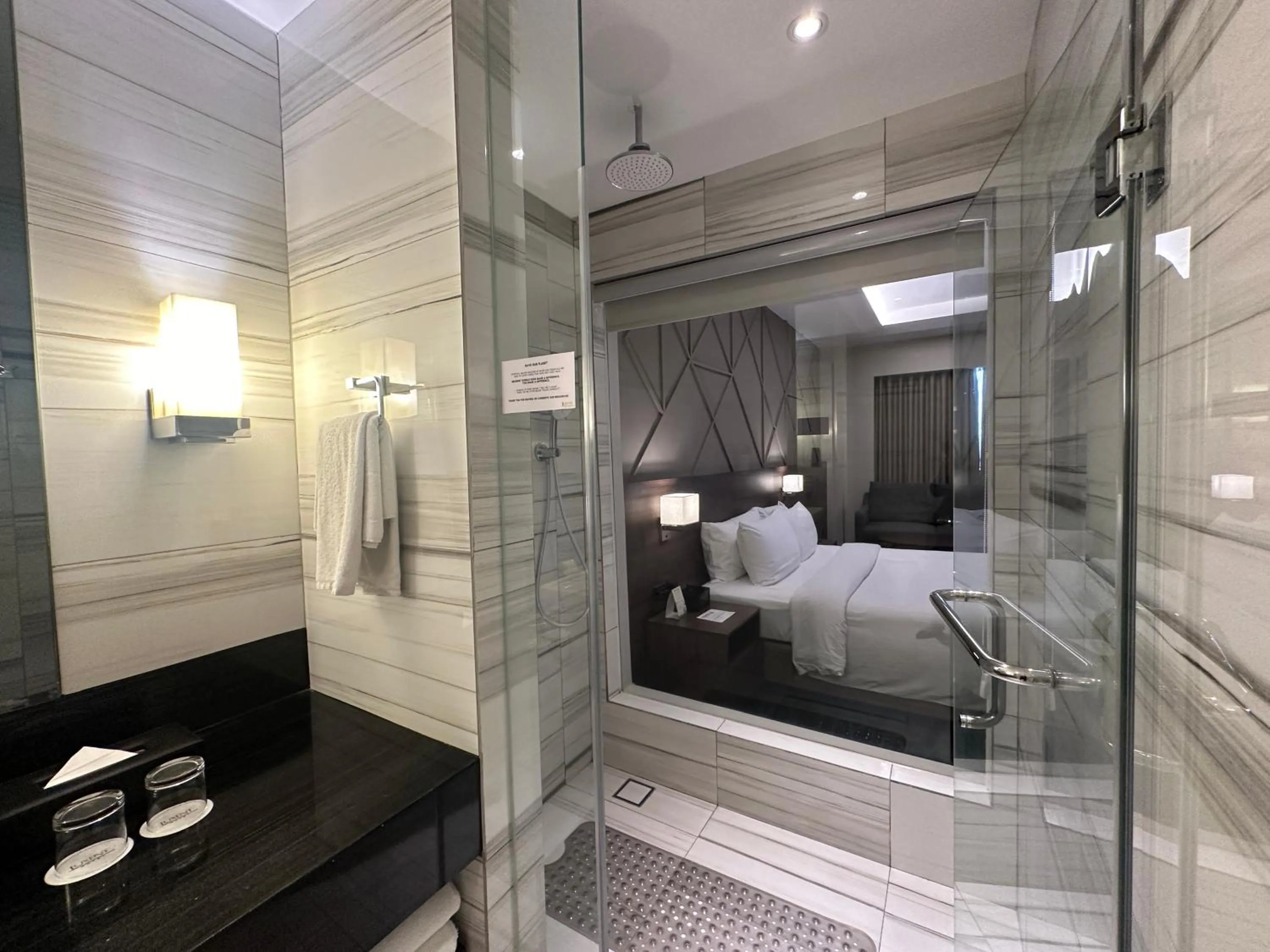 Bathroom, Bed in Luxent Hotel