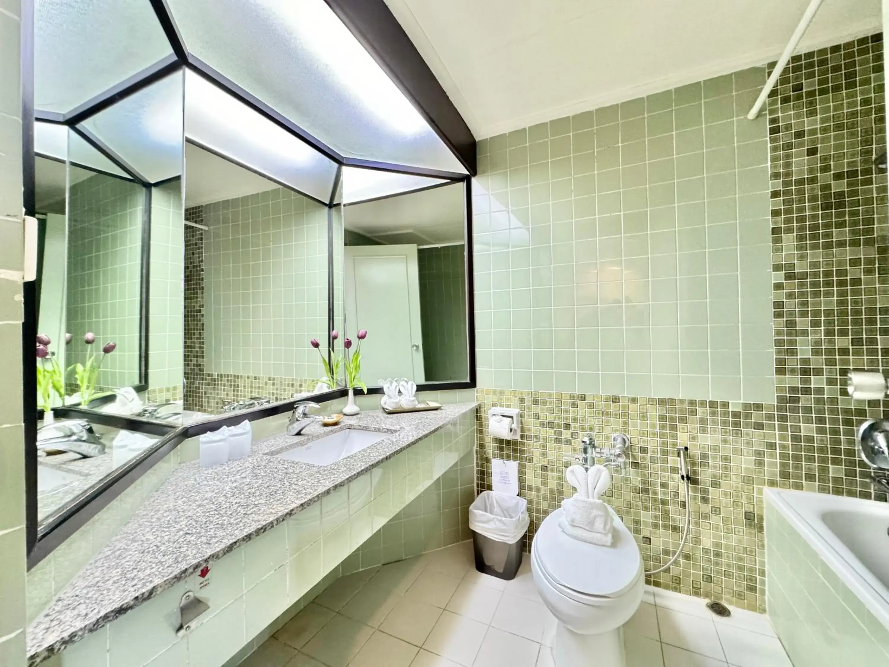 Bathroom in Phuket Merlin Hotel Bathroom in Phuket Merlin Hotel