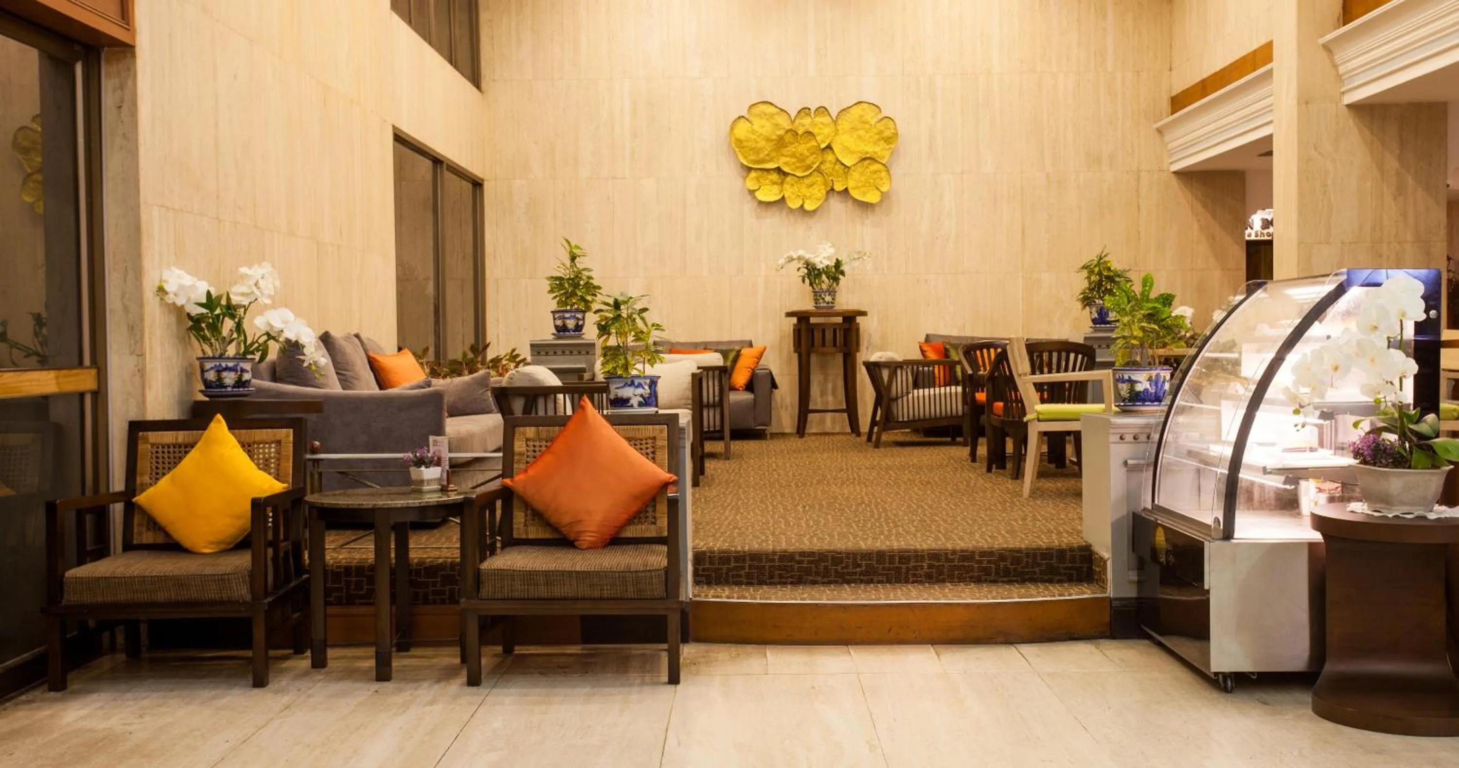 Communal lounge/ TV room in Phuket Merlin Hotel