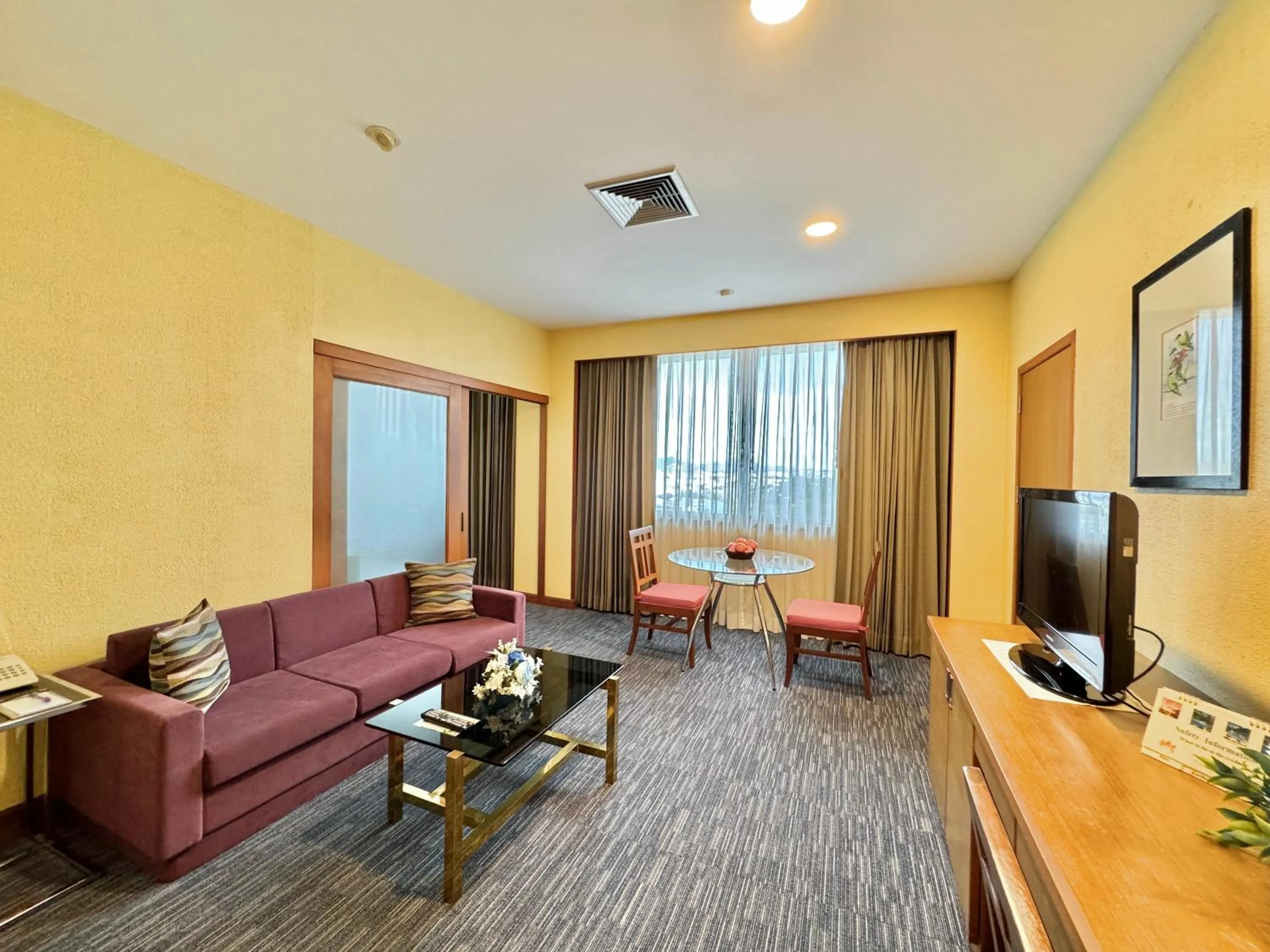 Living room in Phuket Merlin Hotel