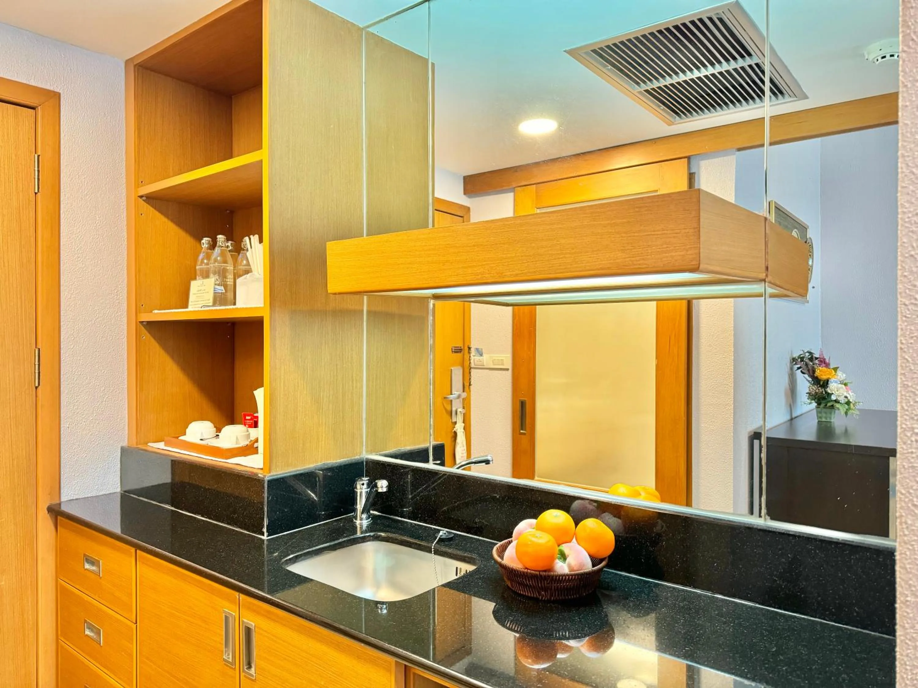 Kitchen or kitchenette in Phuket Merlin Hotel