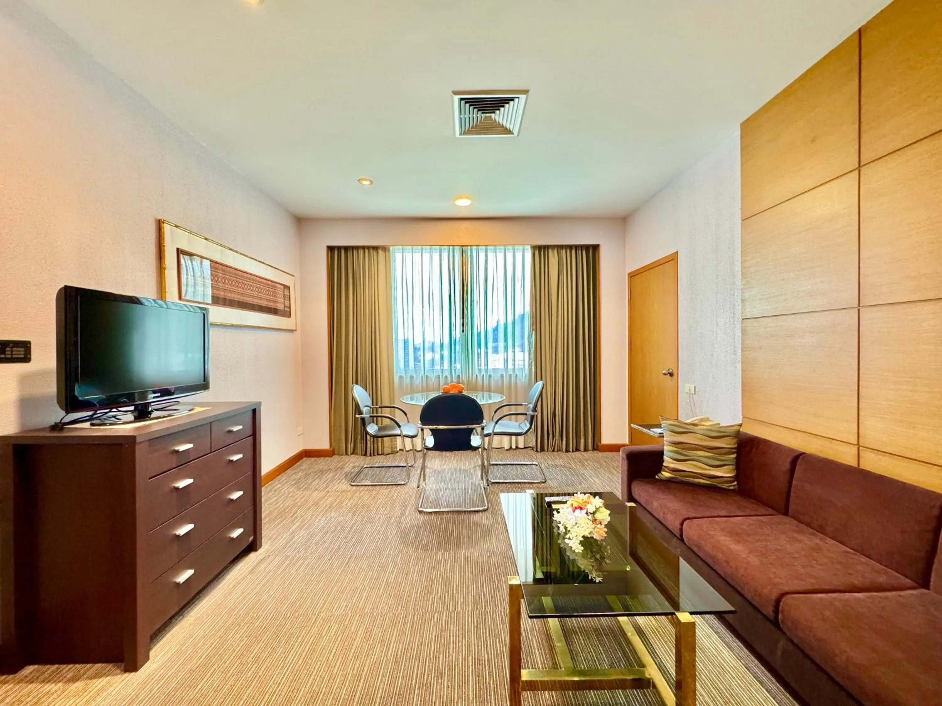 Living room in Phuket Merlin Hotel