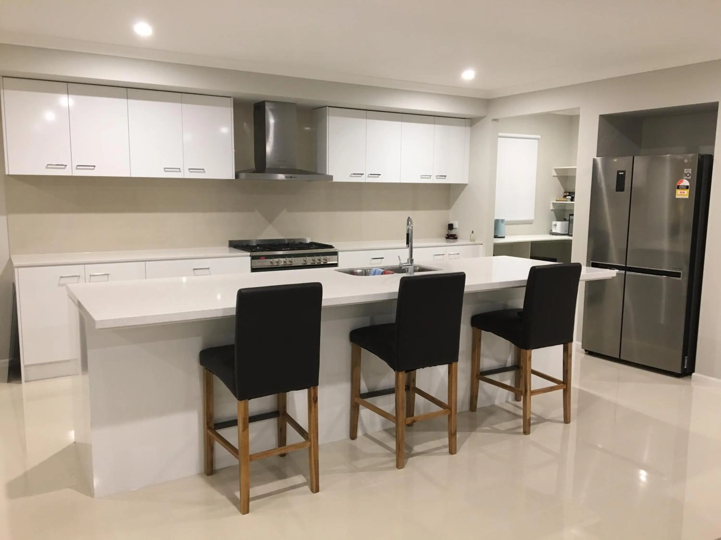 Communal kitchen in Apple House Truganina