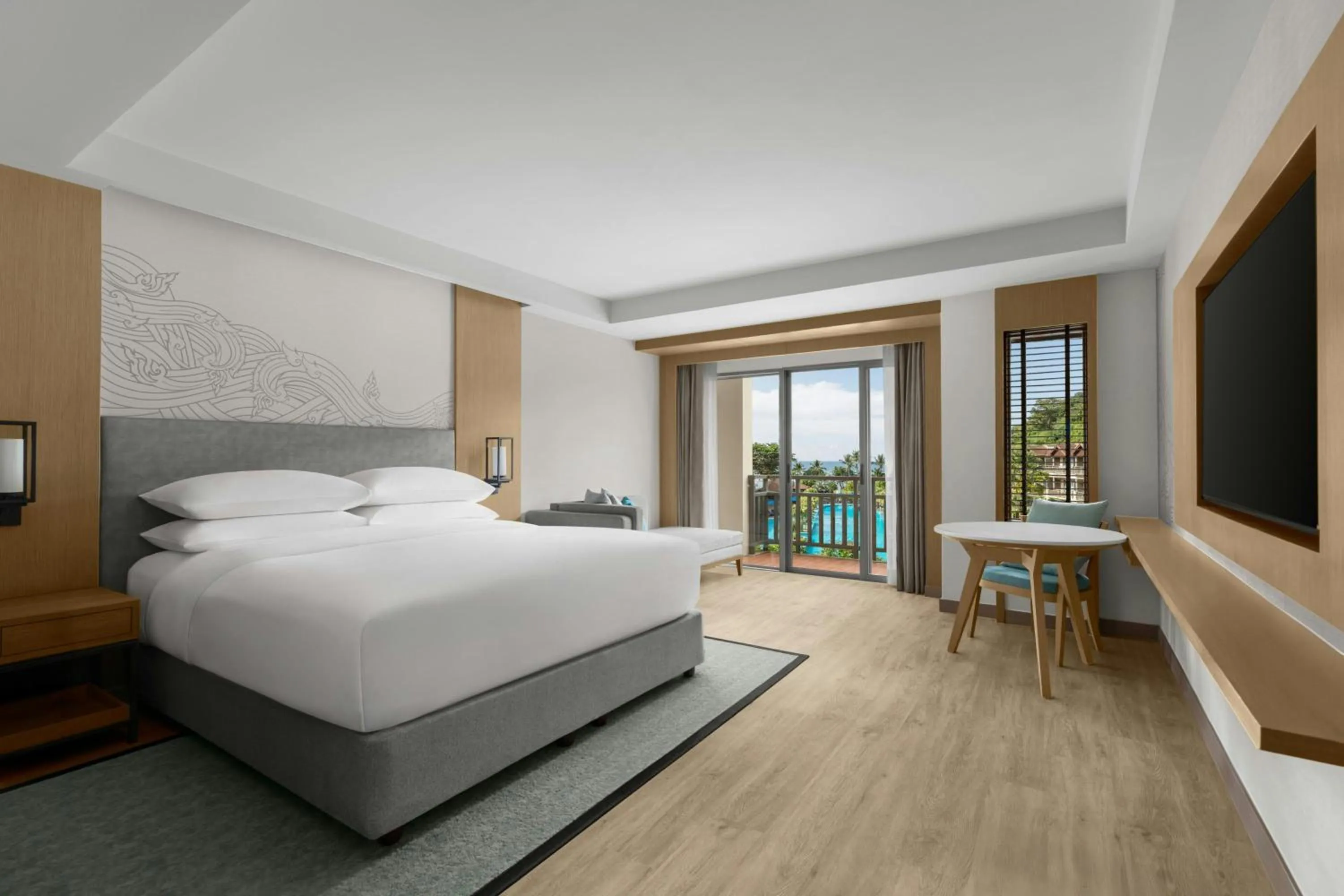 Photo of the whole room, Bed in Phuket Marriott Resort & Spa, Merlin Beach